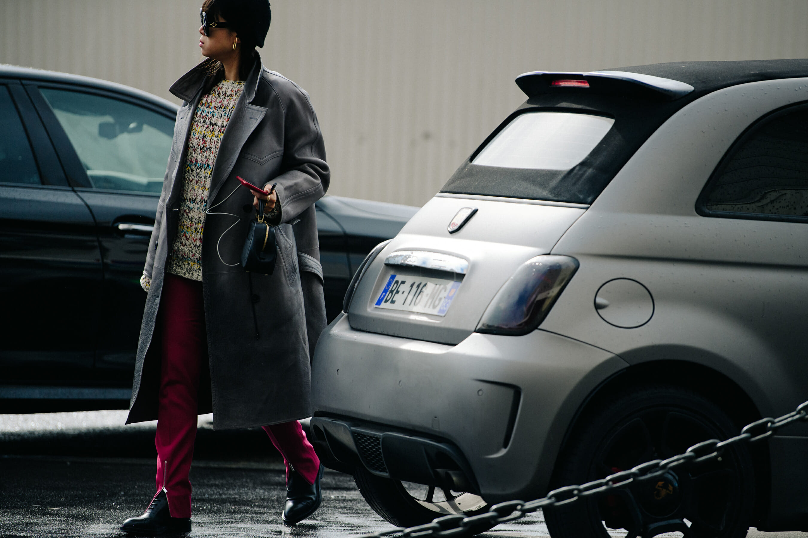 Woman wearing long grey coat