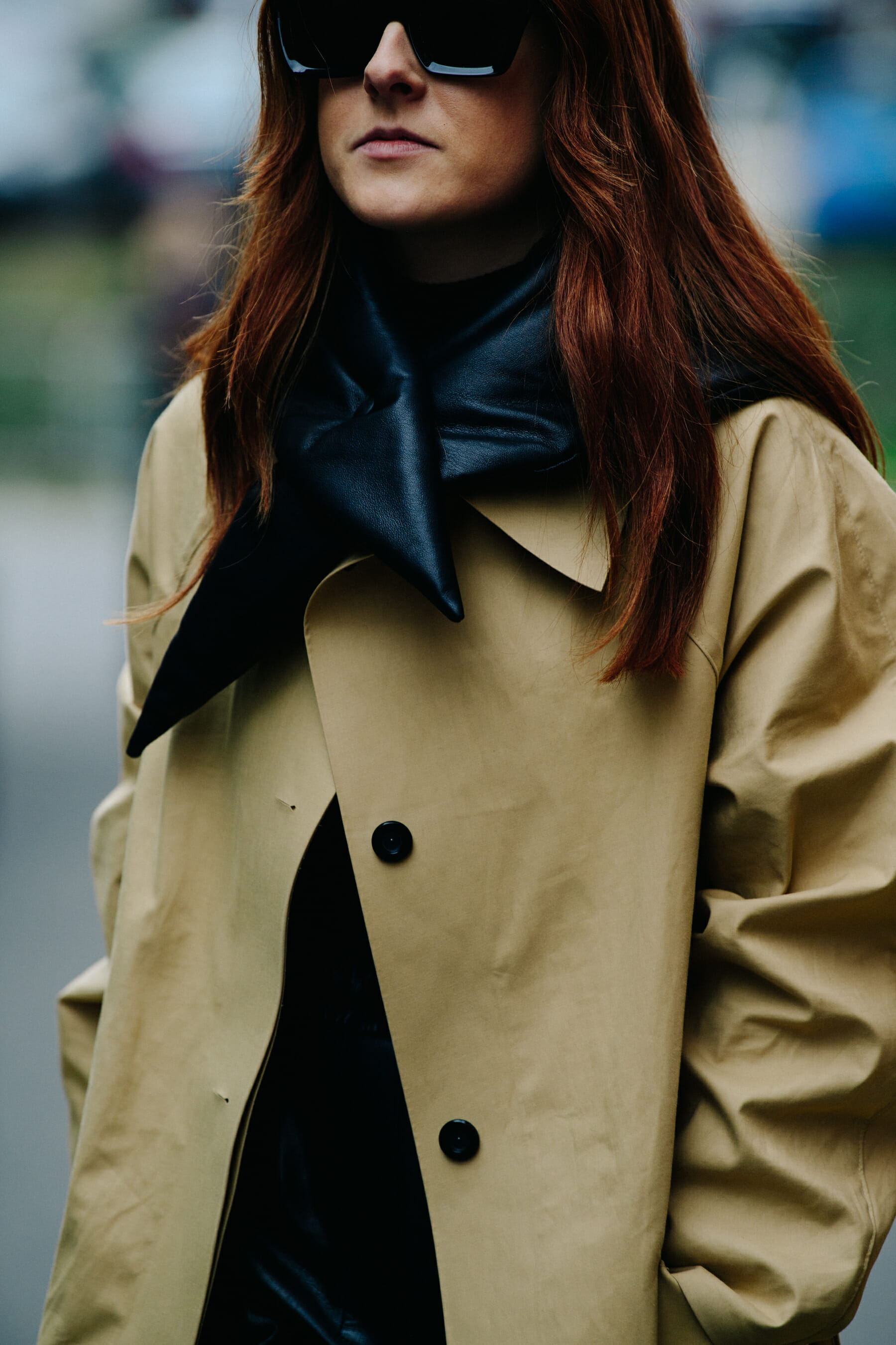 Woman wearing tan coat