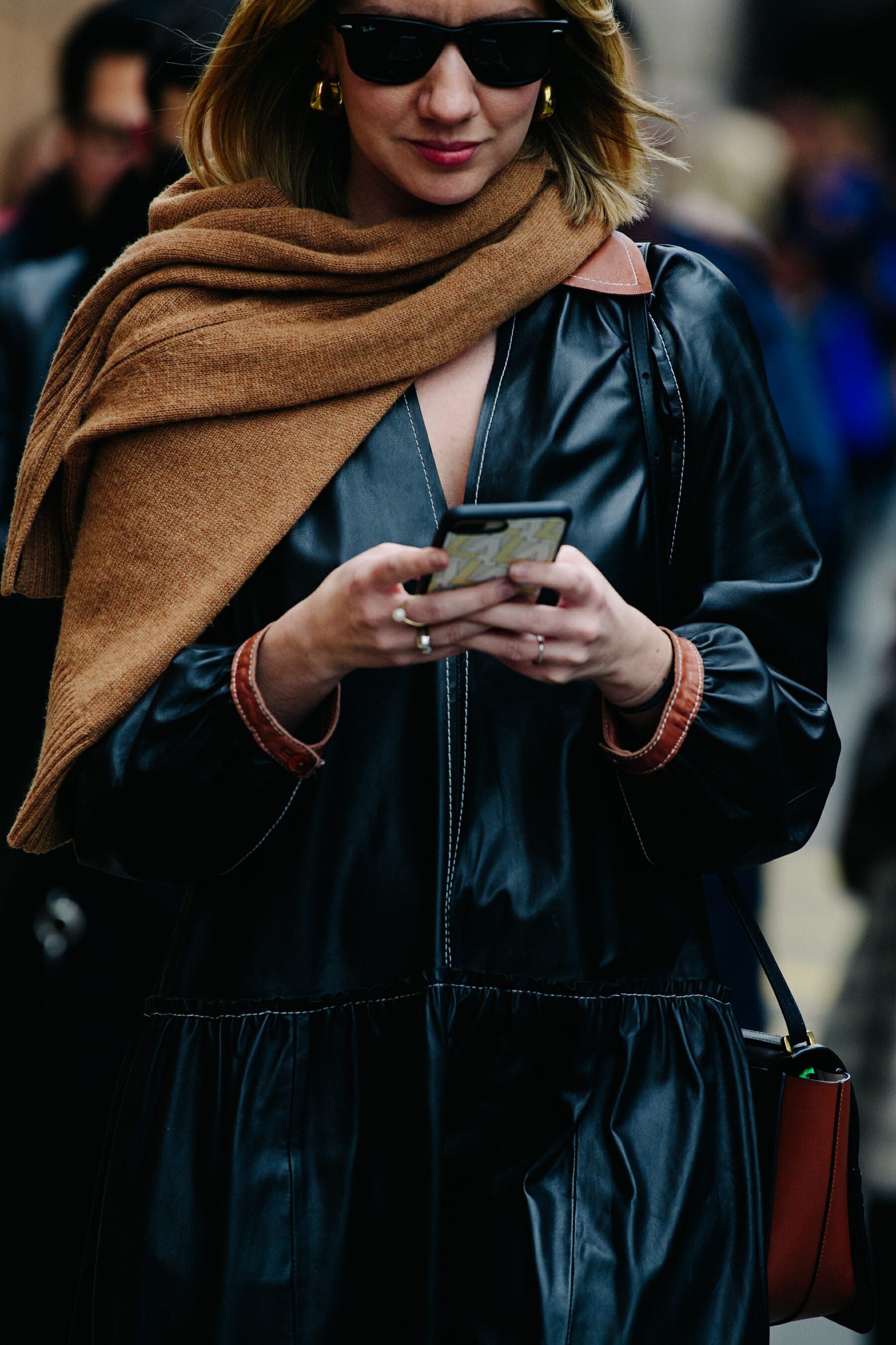 Woman wearing brown scarf