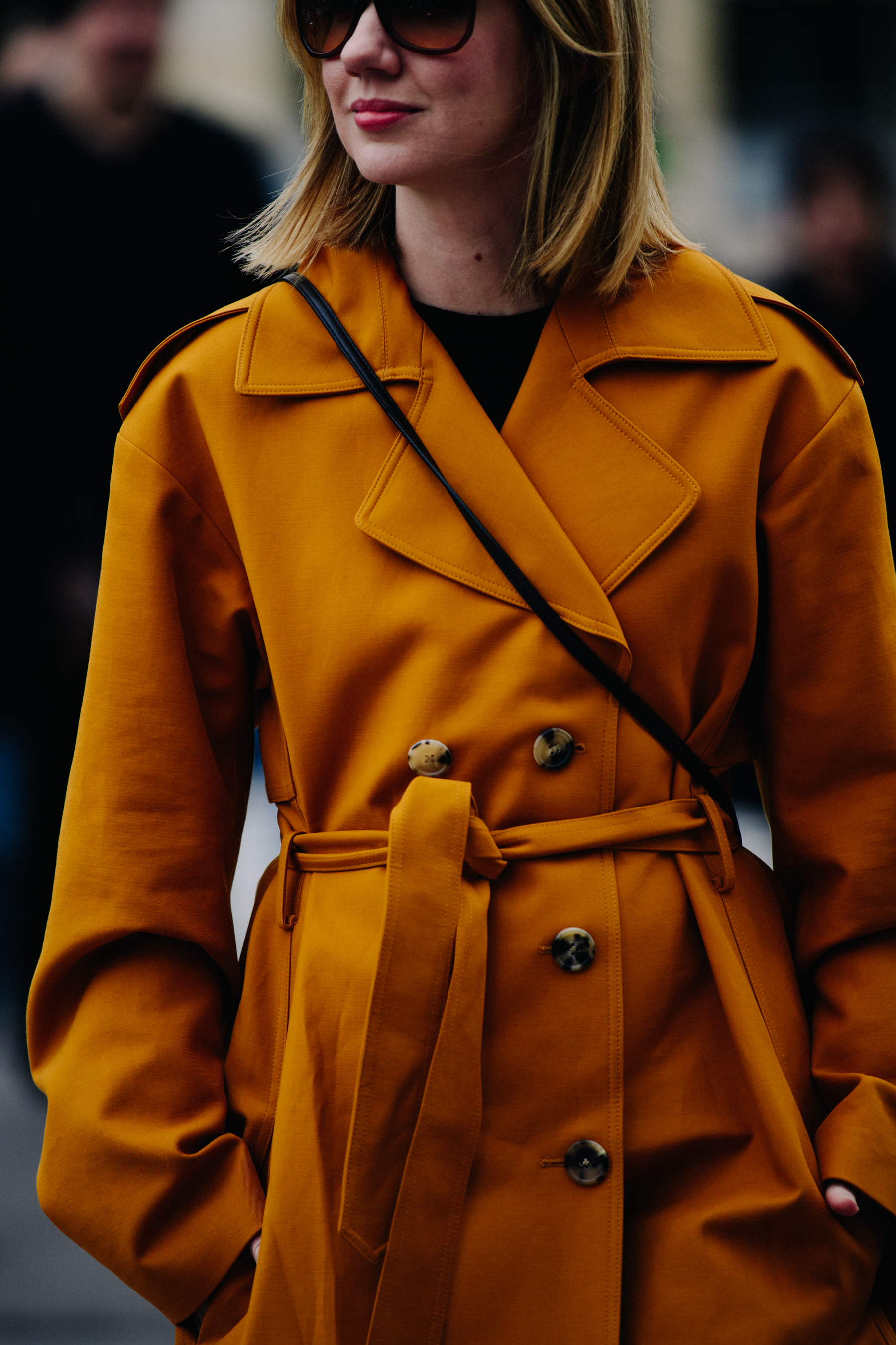 Woman wearing orange coat