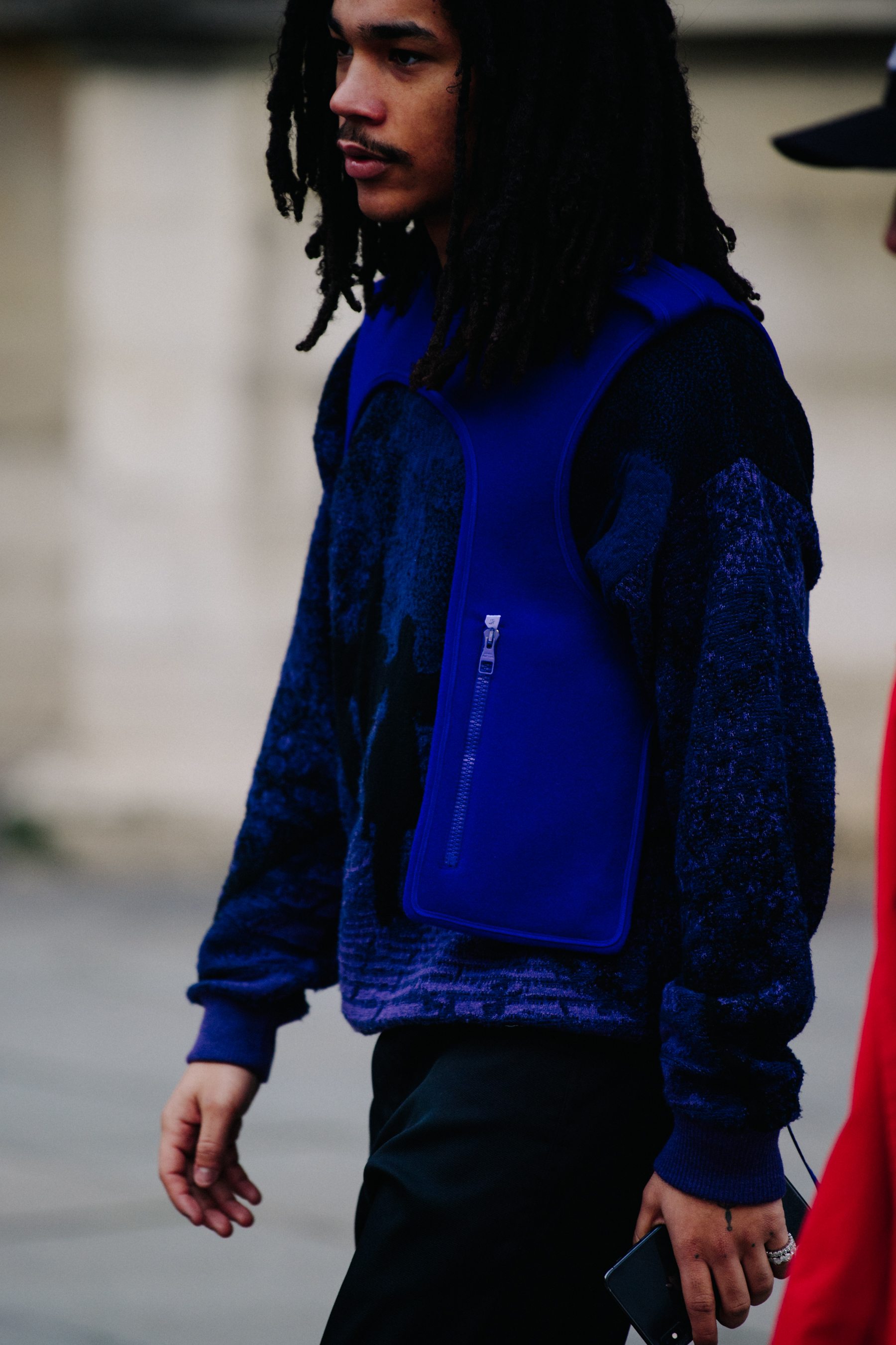 Man wearing Louis Vuitton jacket