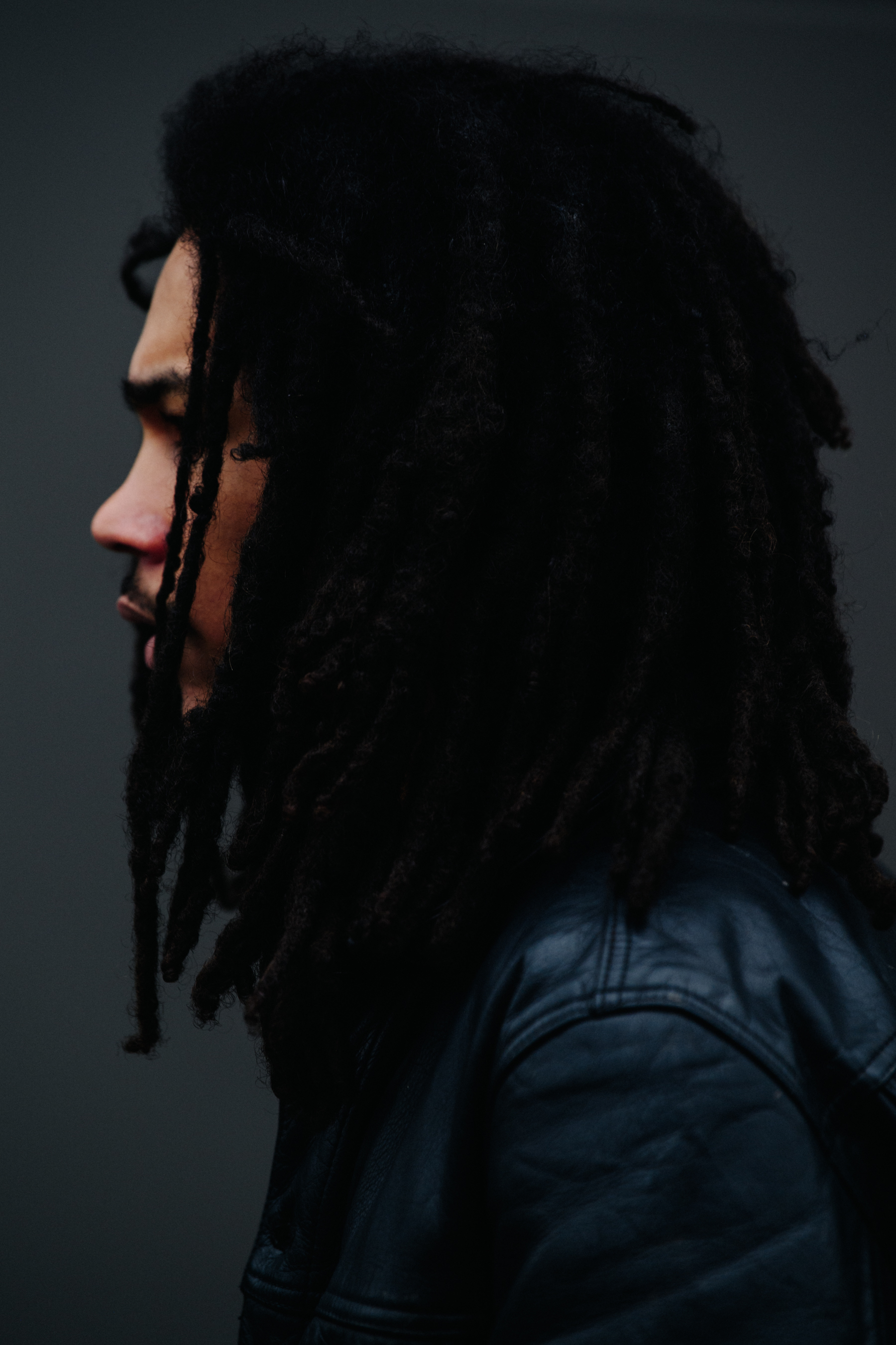 Man wearing black leather jacket