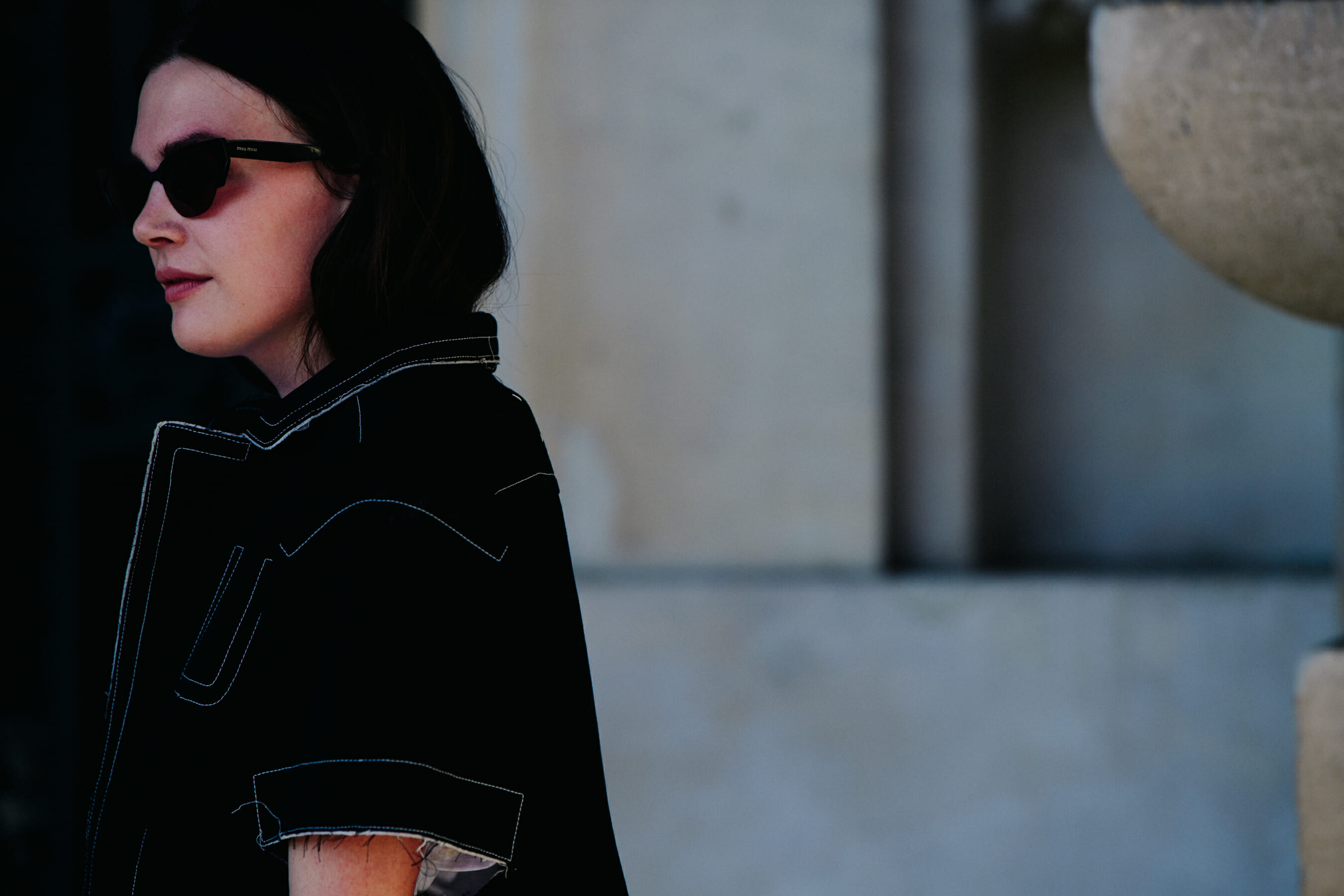 Woman wearing Miu Miu glasses