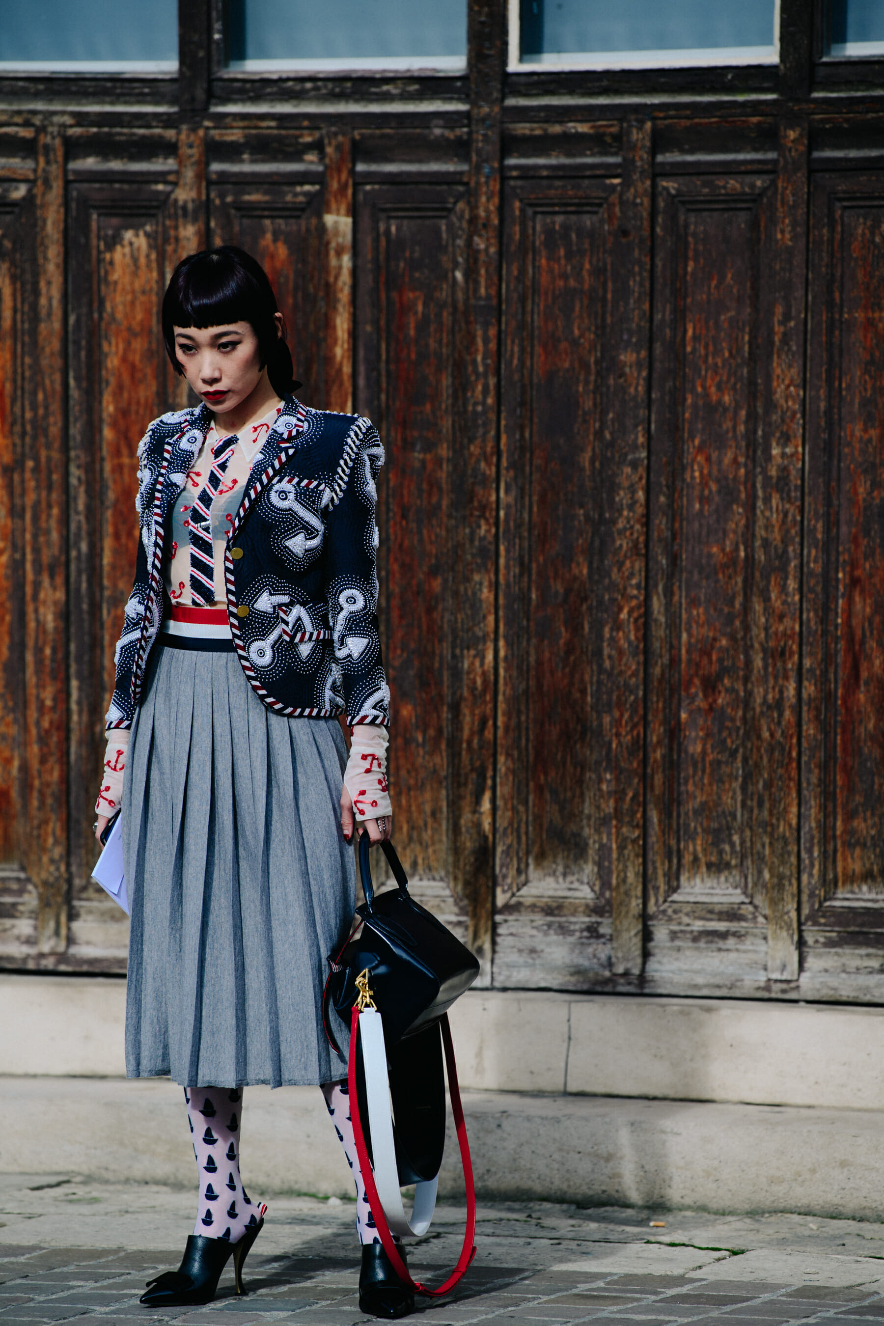 Woman wearing Thom Browne outfit