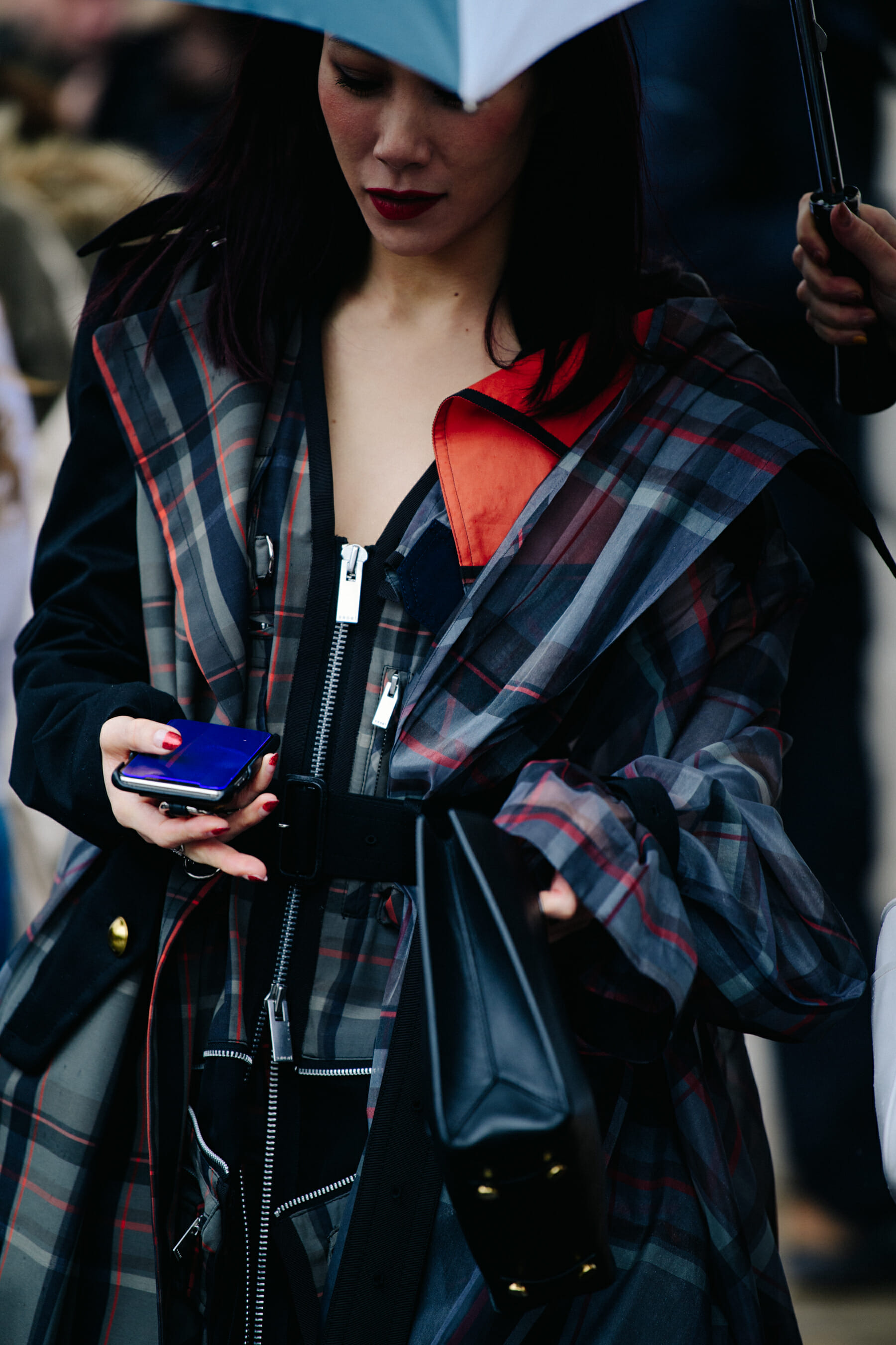 Woman wearing check jacket