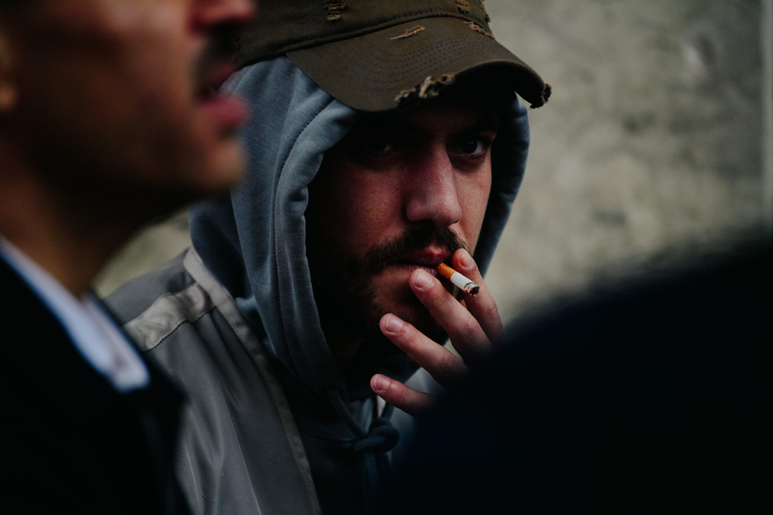 Man wearing green cap