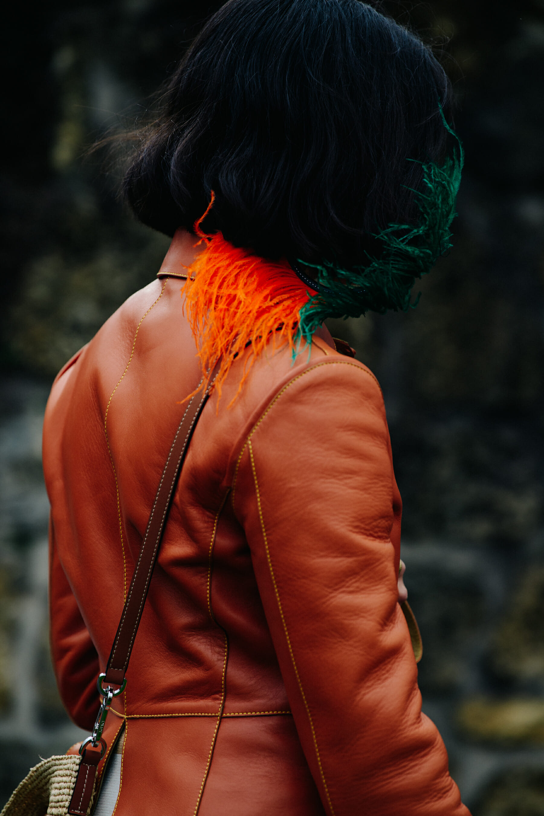 Woman wearing brown leather coat