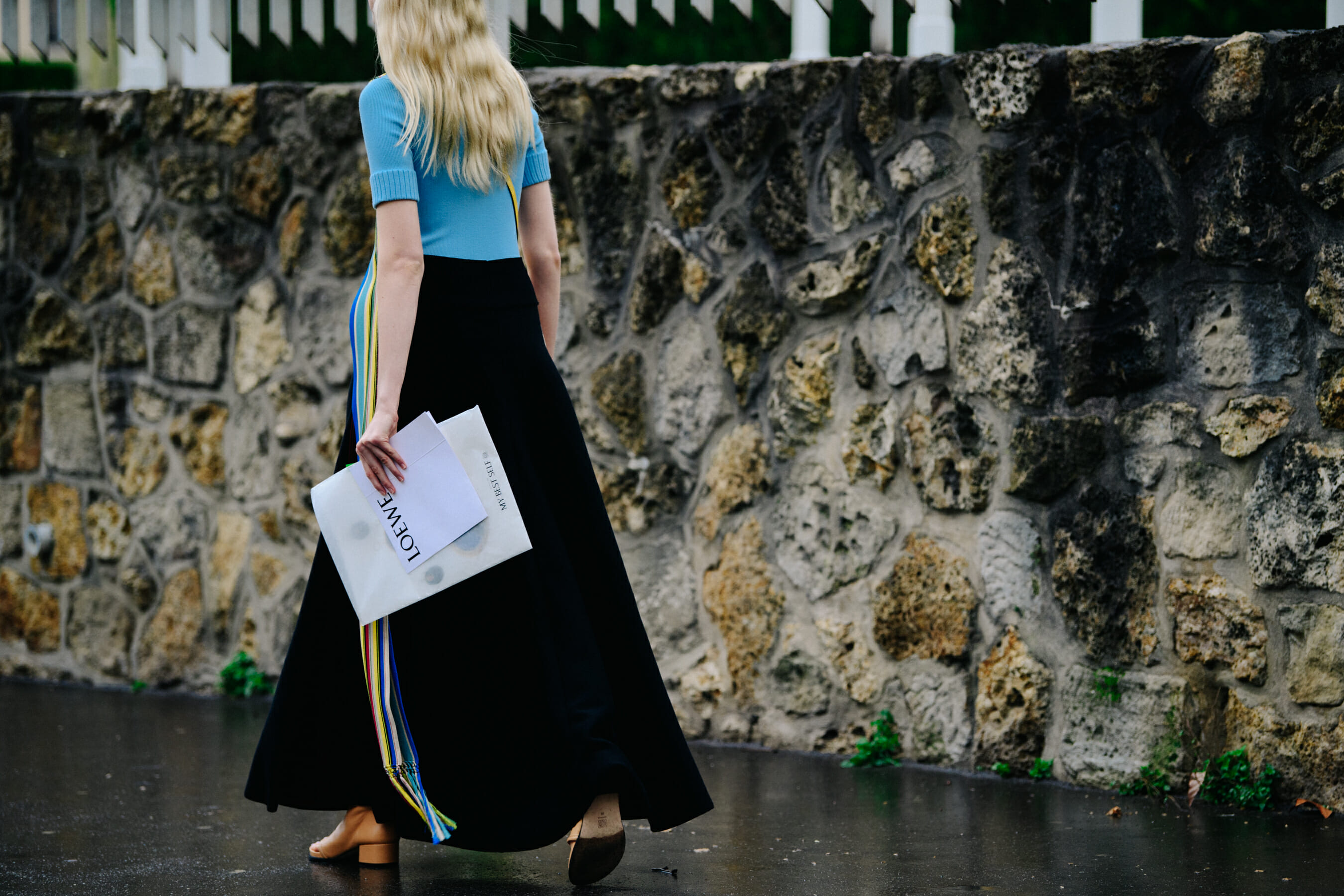 Woman wearing blue striped top