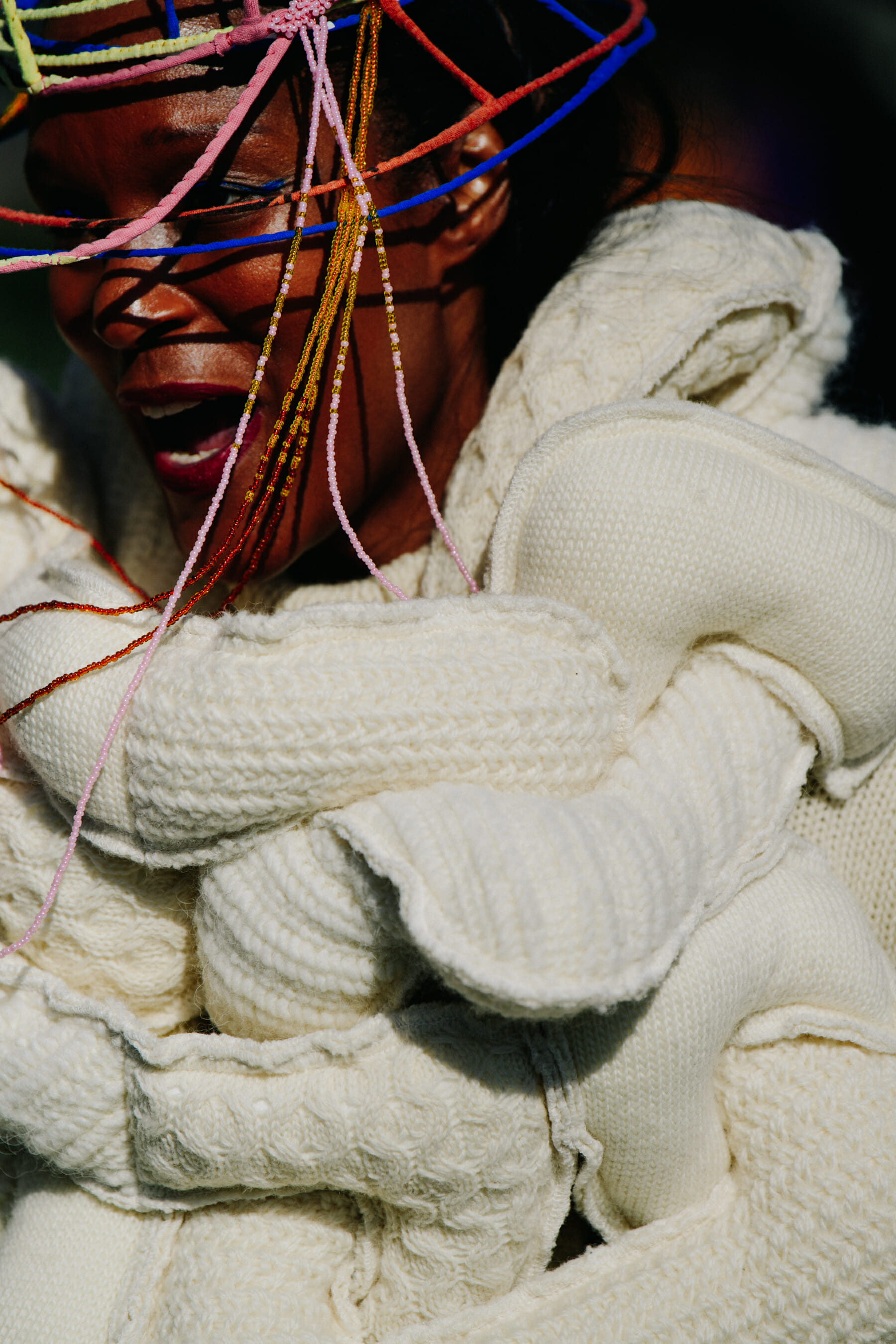 Woman wearing white wool dress