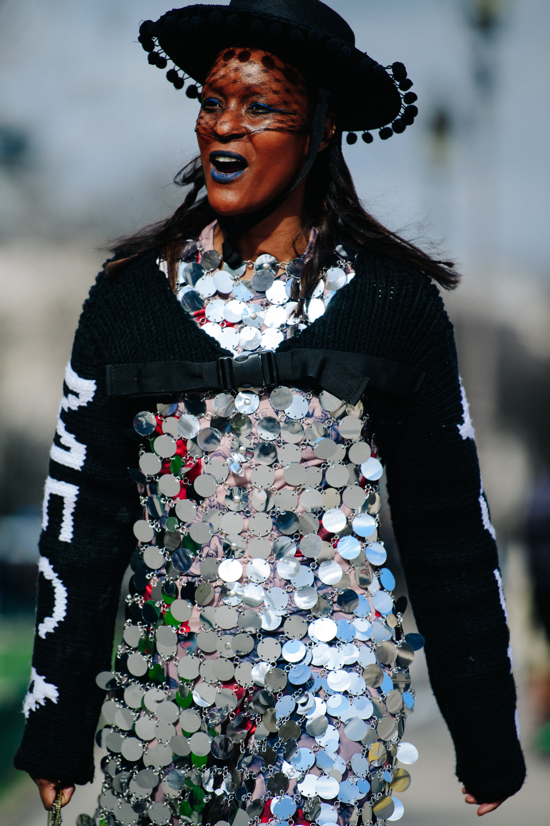 Woman wearing silver sequin top