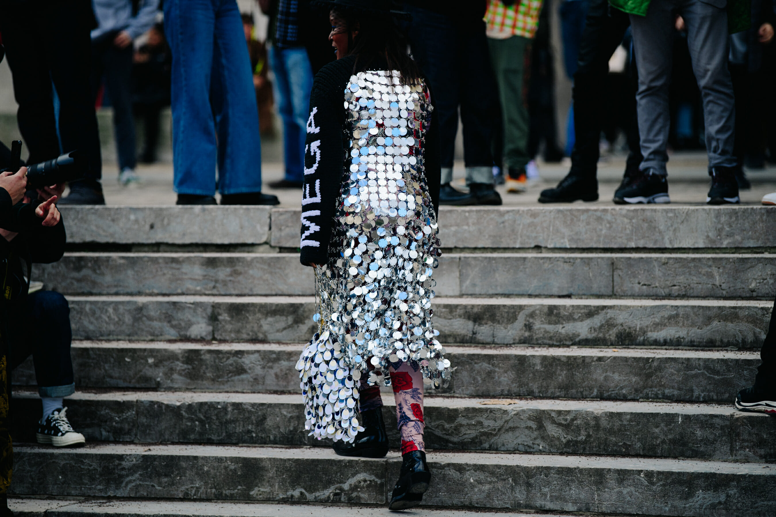 Woman wearing silver sequin top