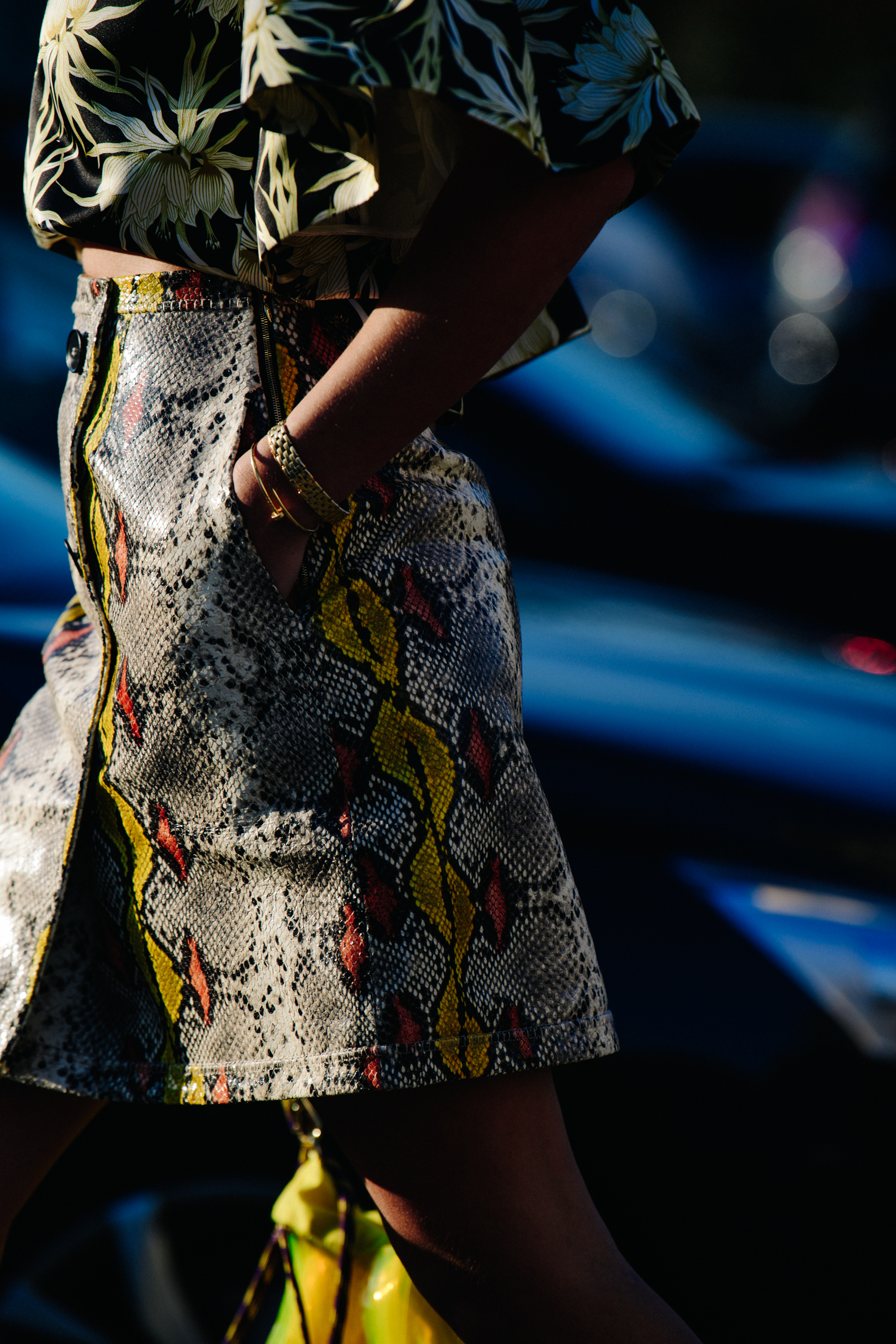 Woman wearing snakeskin skirt