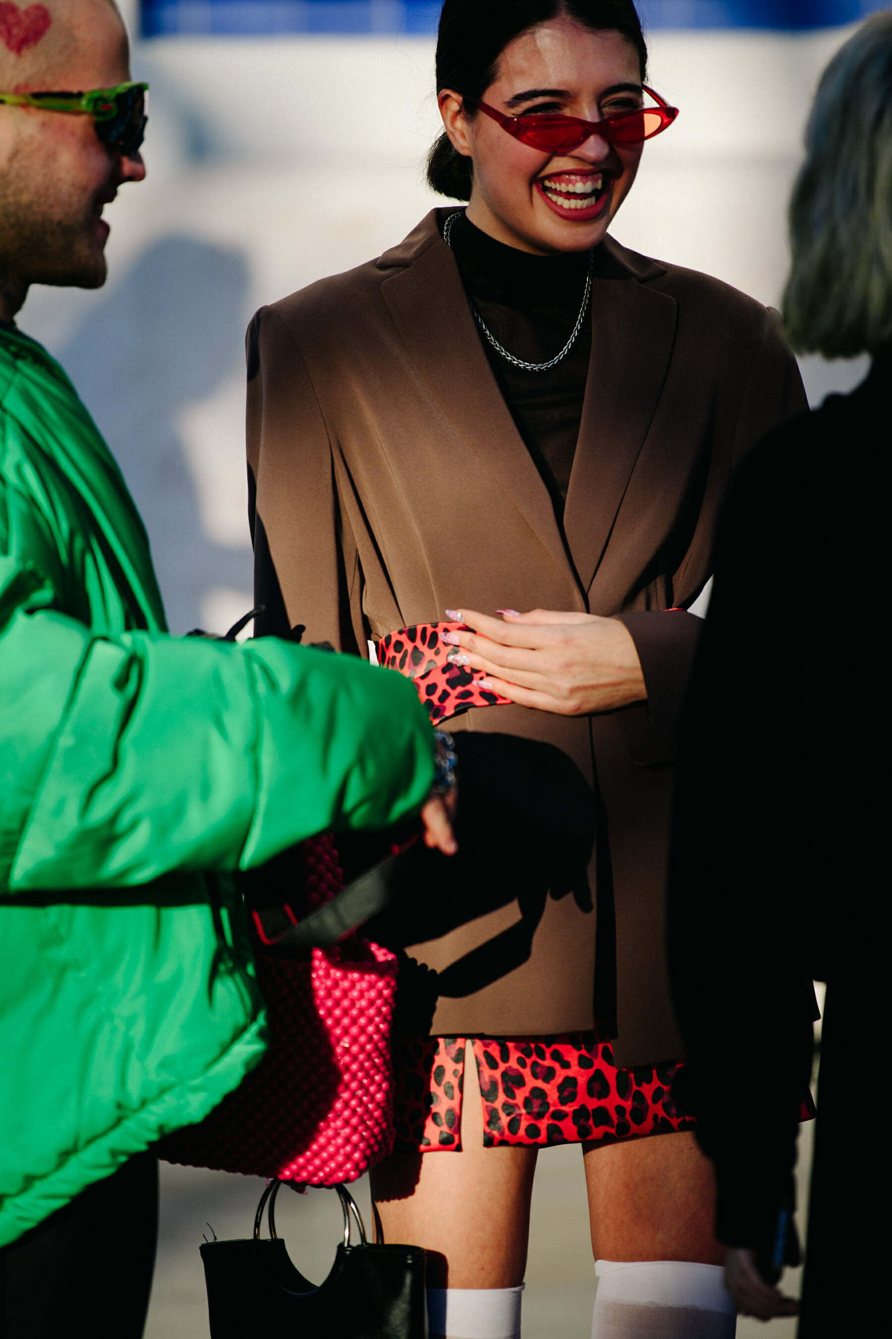 Woman wearing pink sunglasses