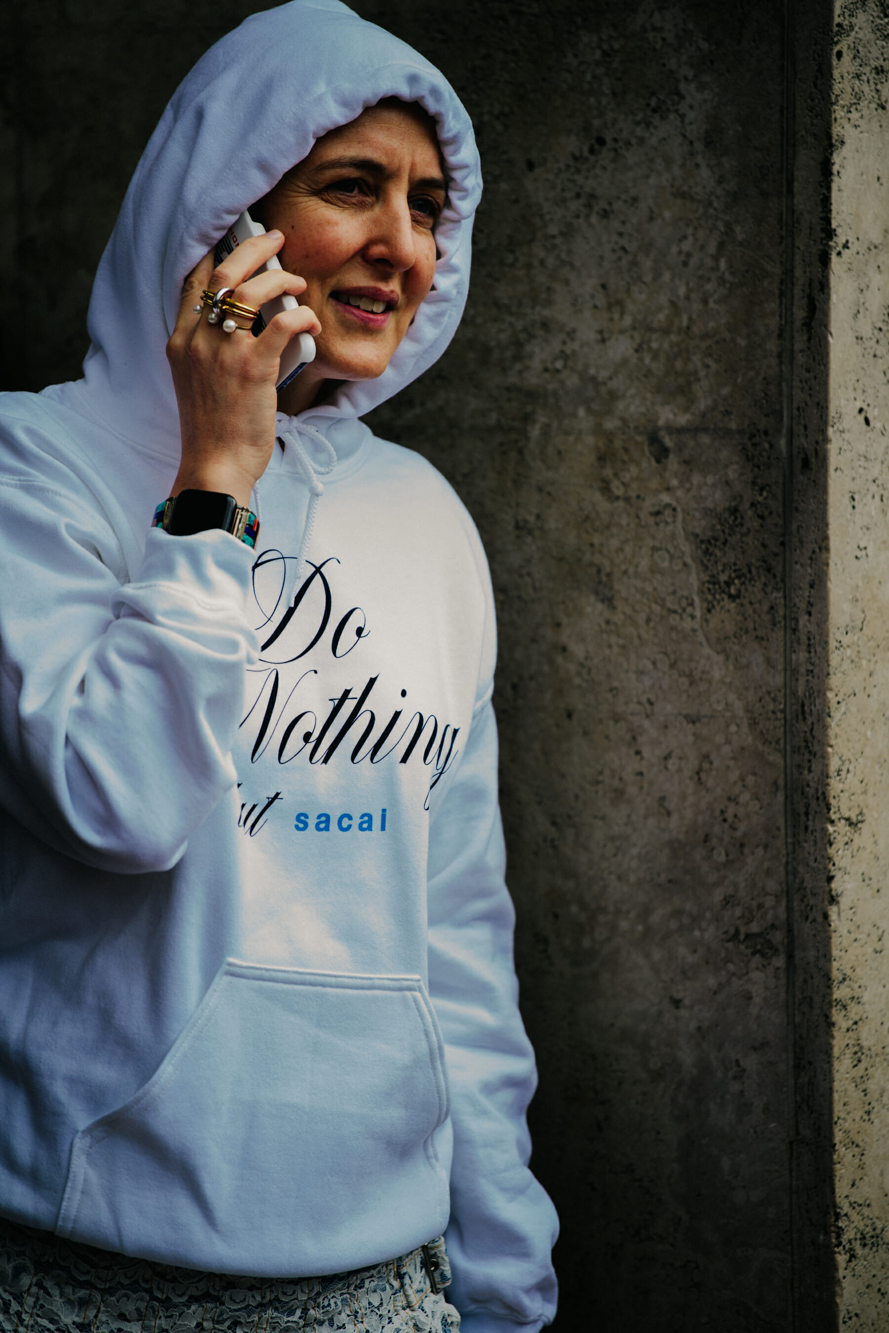 Woman wearing white hoodie