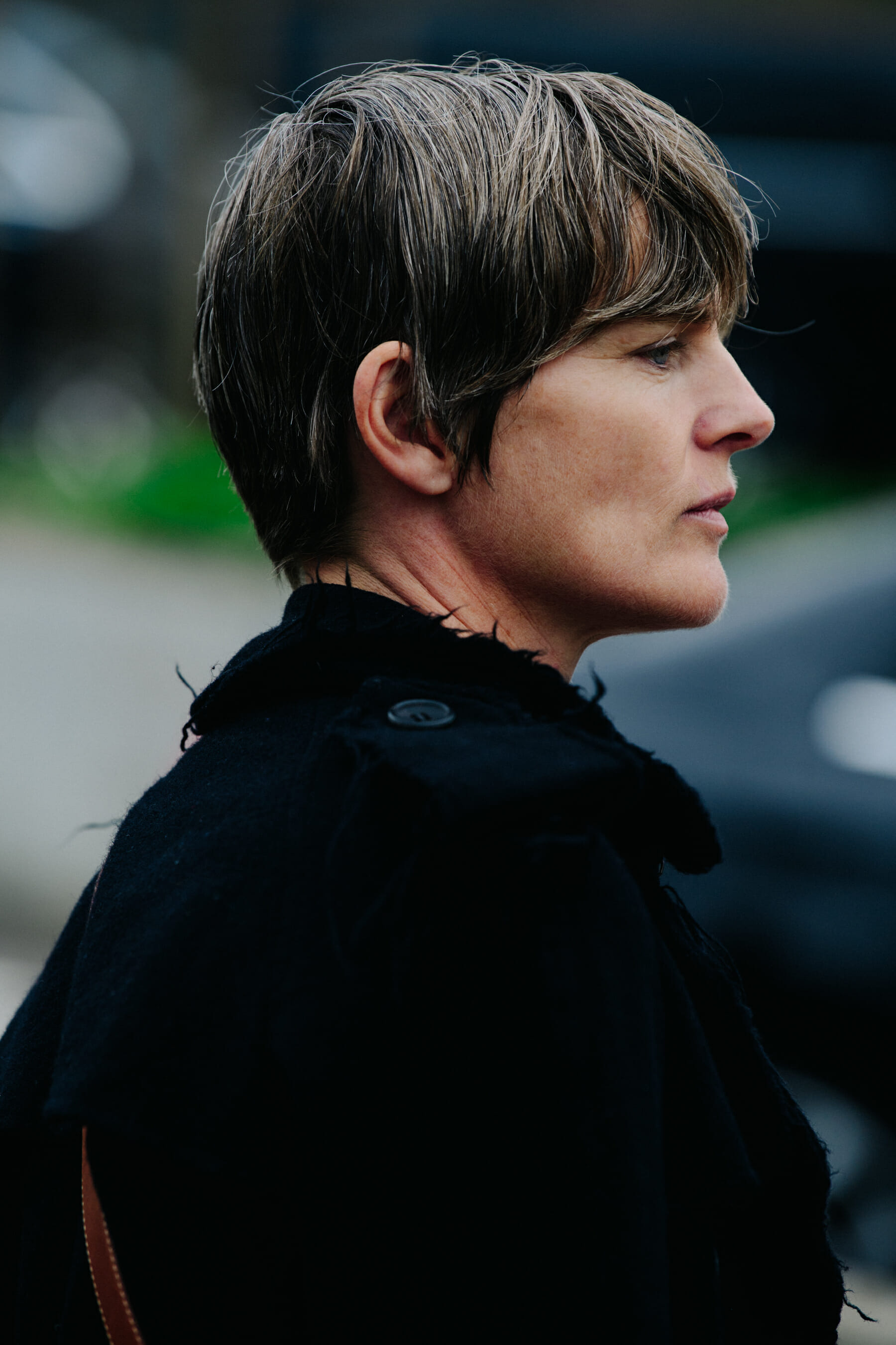 Woman with cropped grey hair