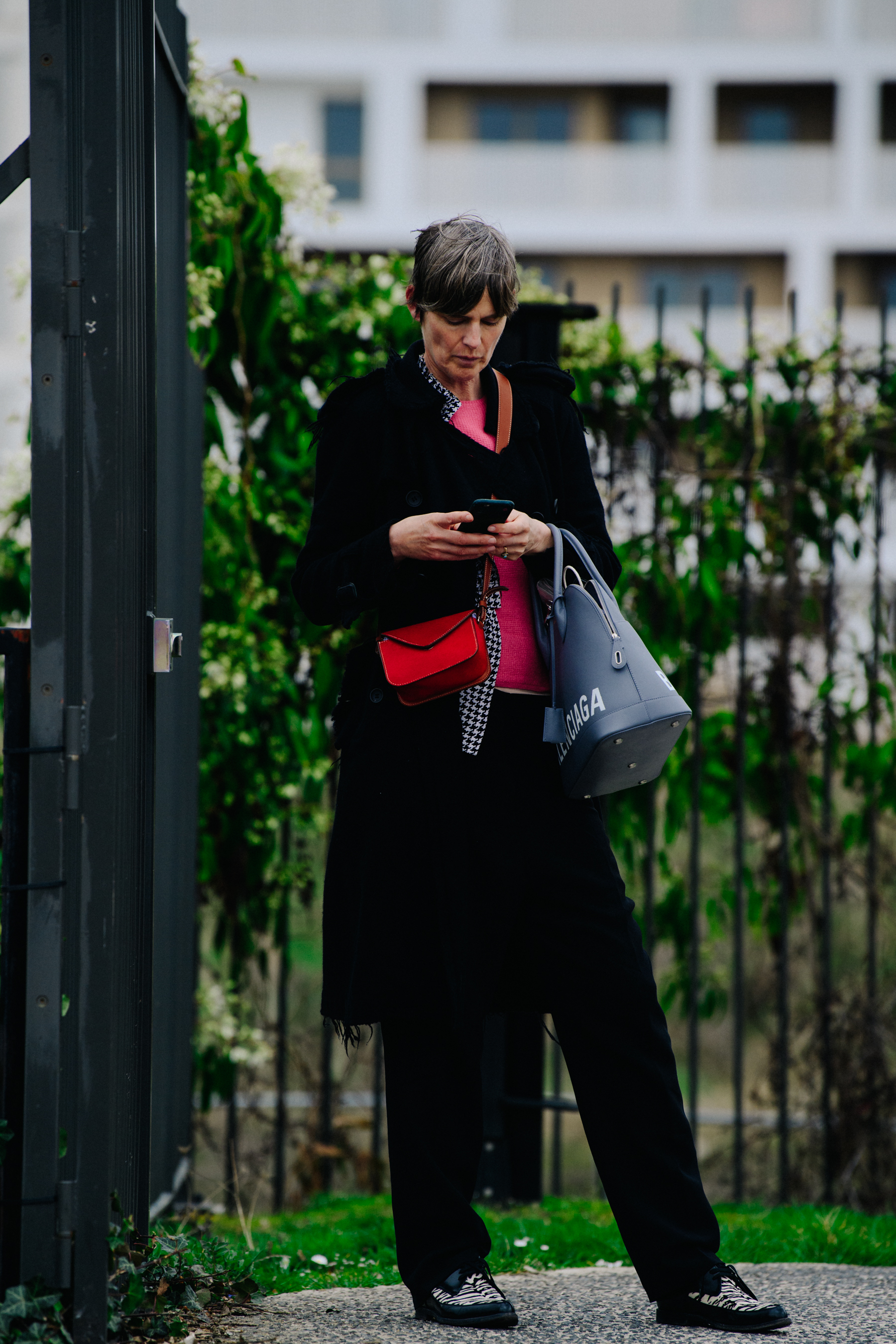 Woman carrying Balenciaga bag