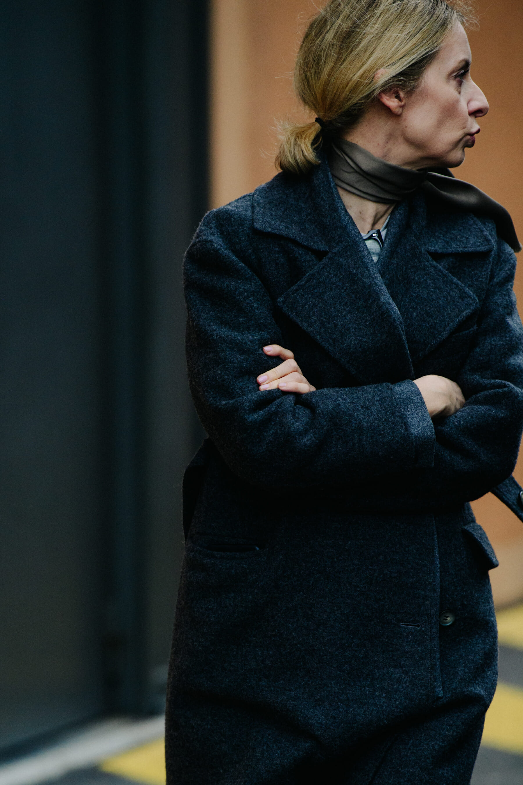 Woman wearing grey jacket