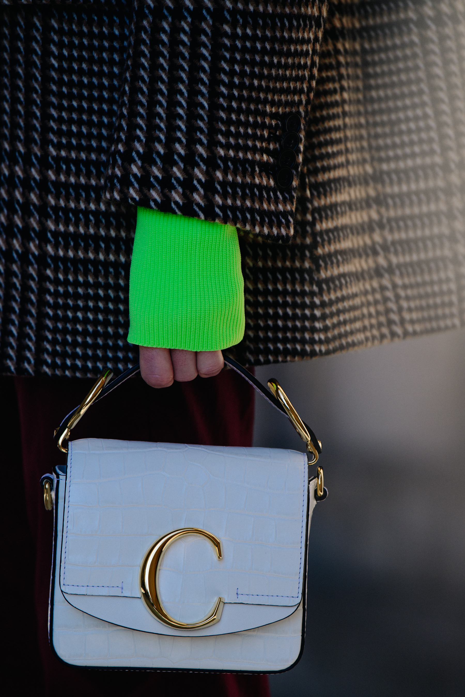 Woman carrying white bag