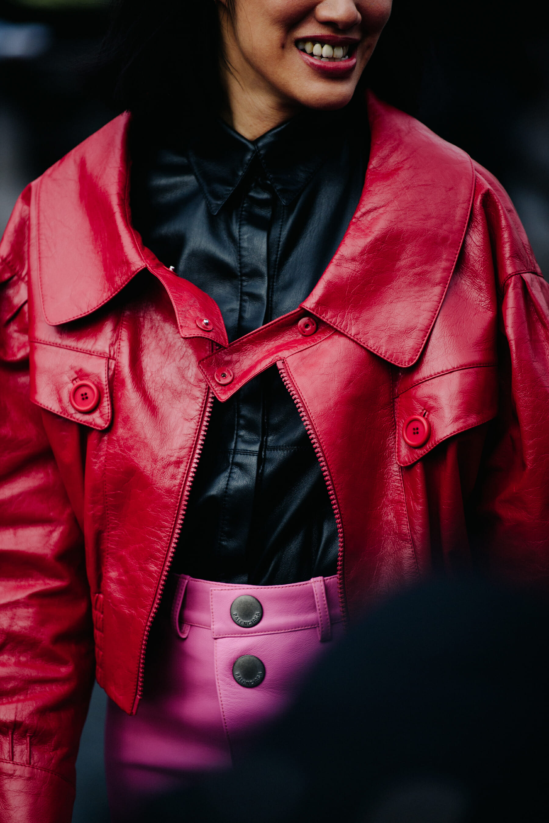 Woman wearing colourful leather outfit