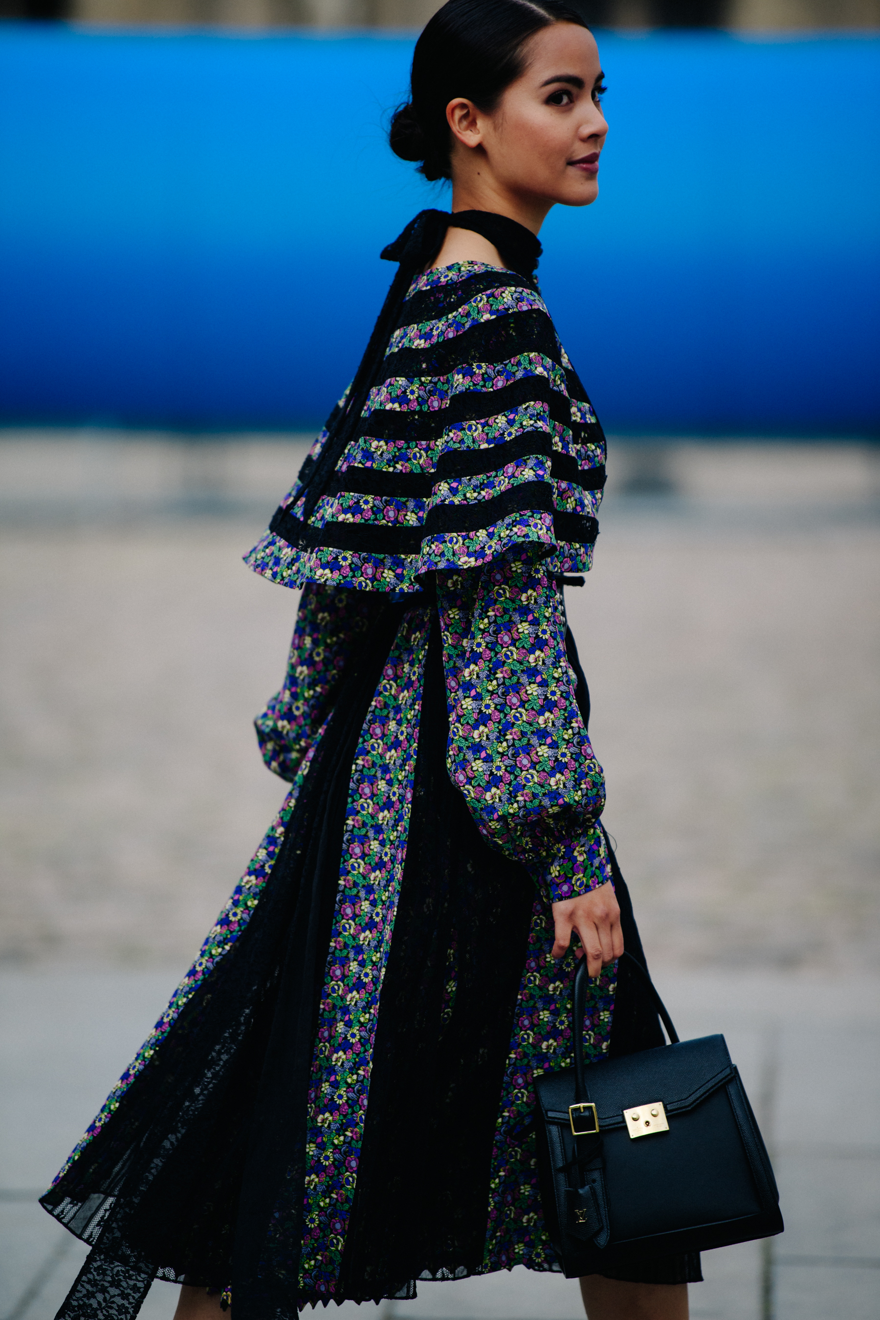 Woman wearing Louis Vuitton outfit