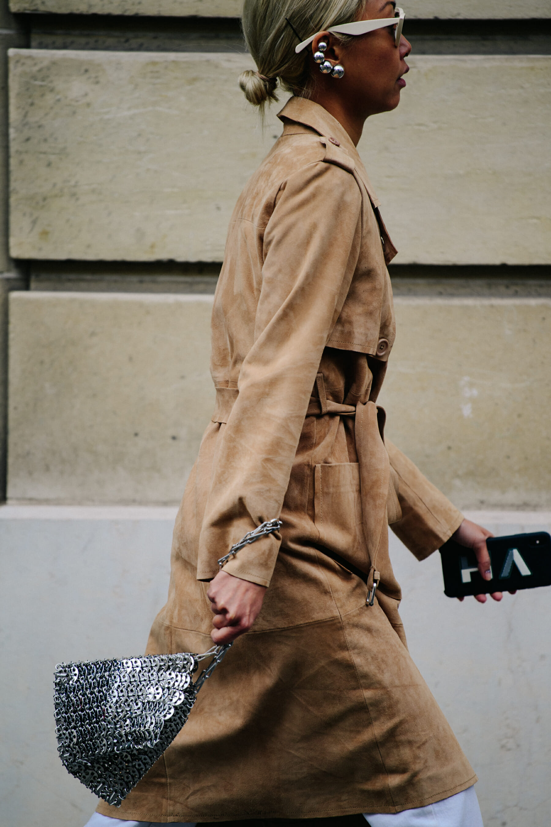 Woman wearing tan coat