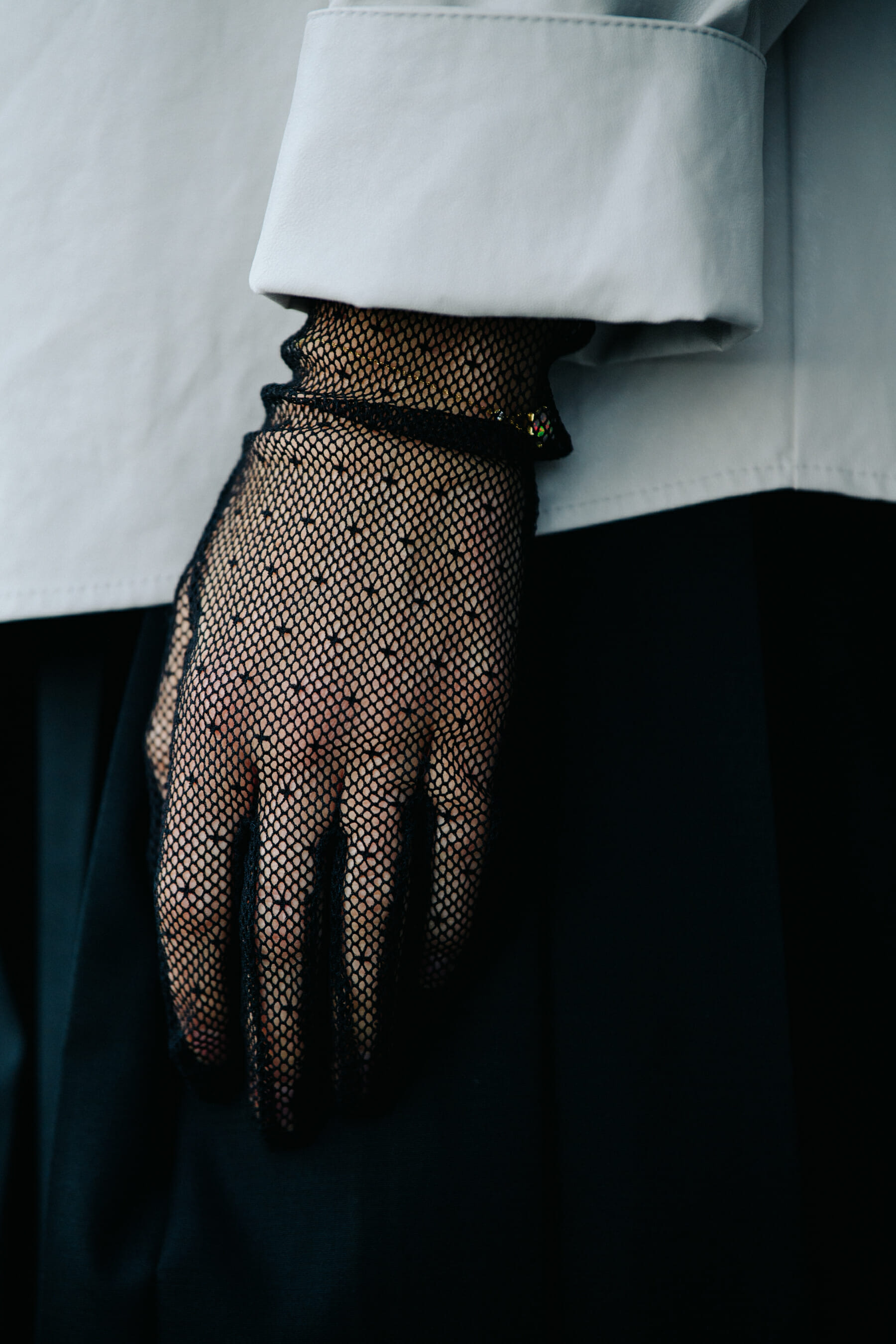 Woman wearing lace glove