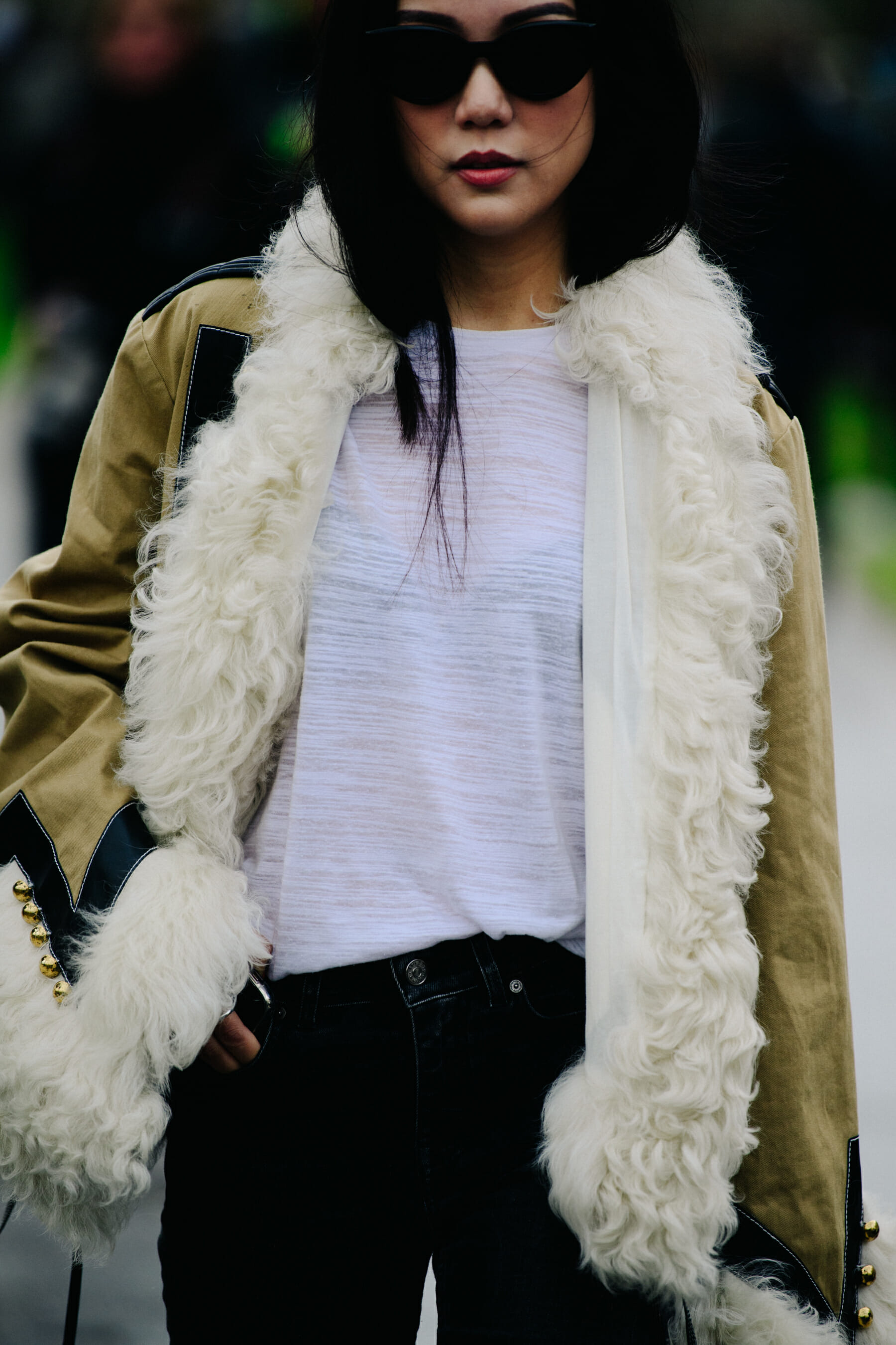 Woman wearing sheep skin jacket