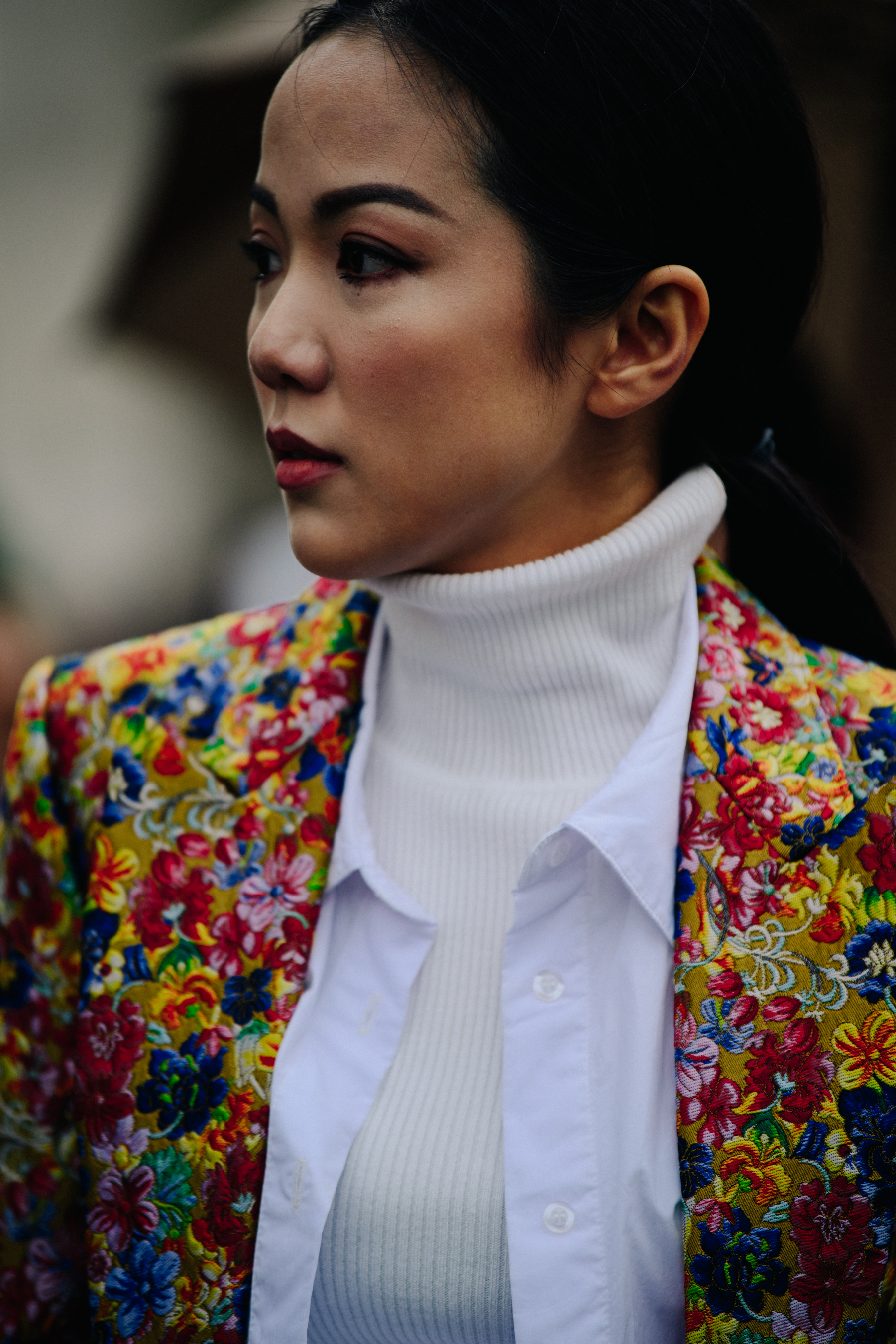 Woman wearing floral jacket