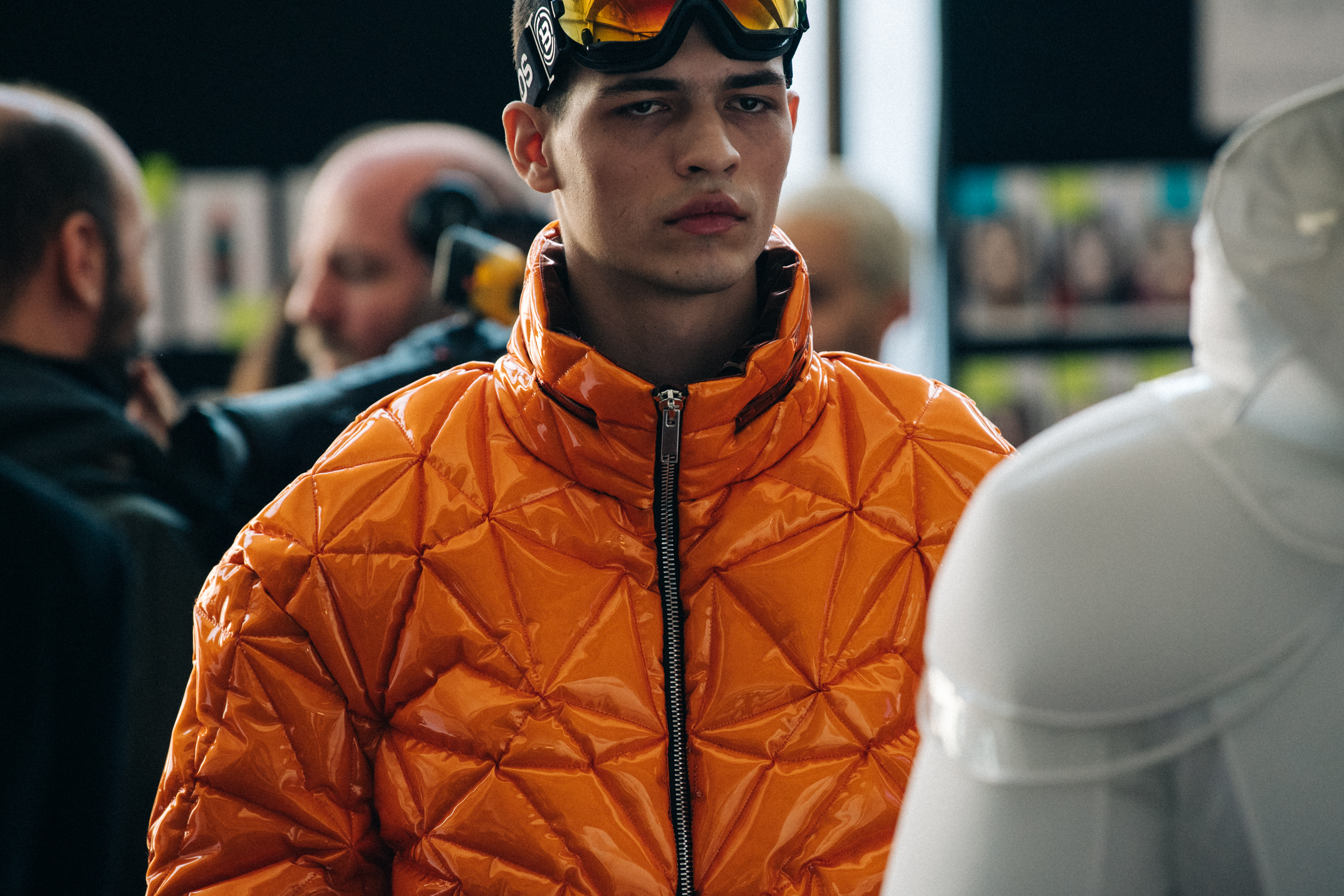 Model wearing orange outfit at Byblos