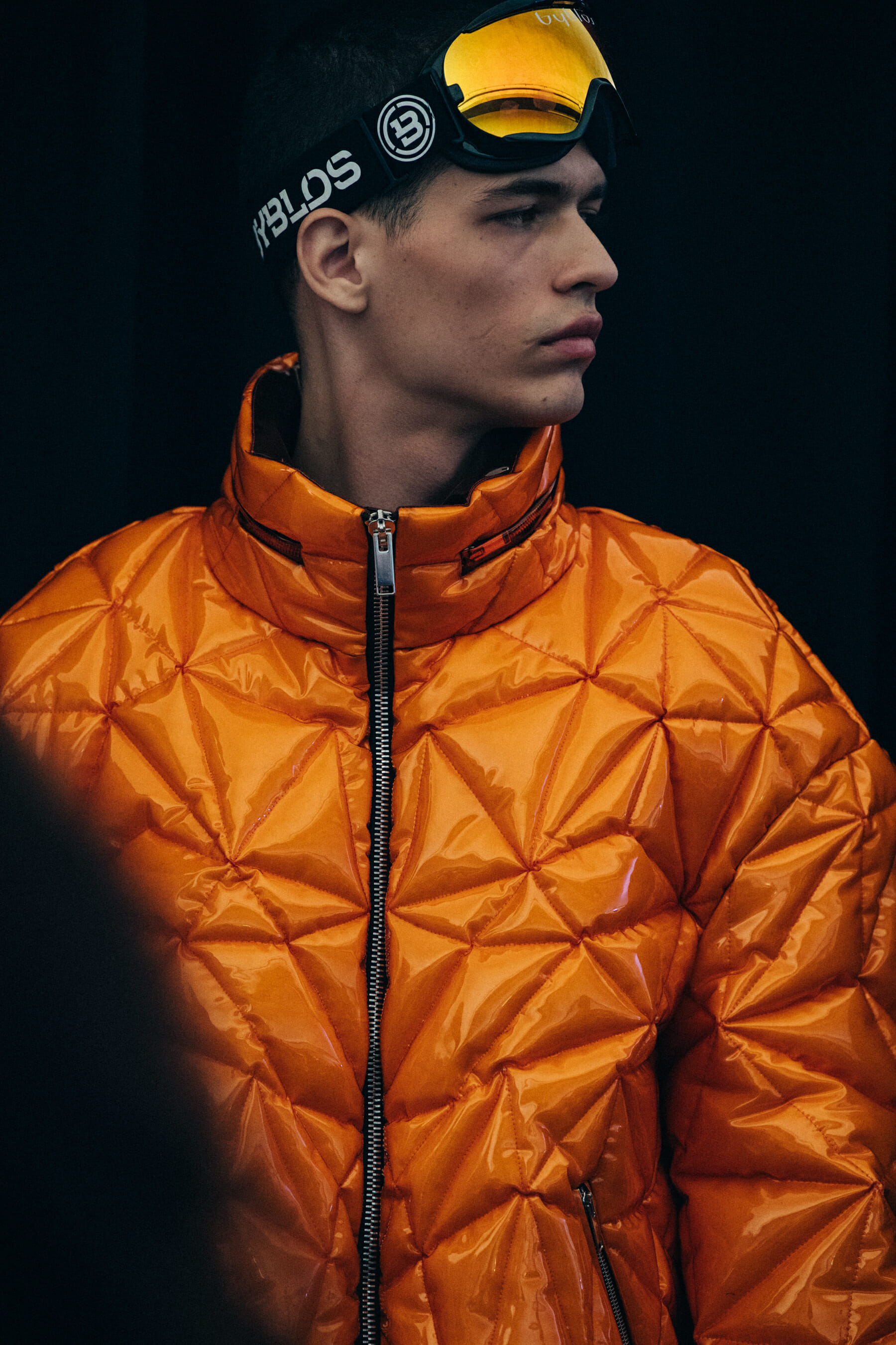 Model wearing orange outfit at Byblos
