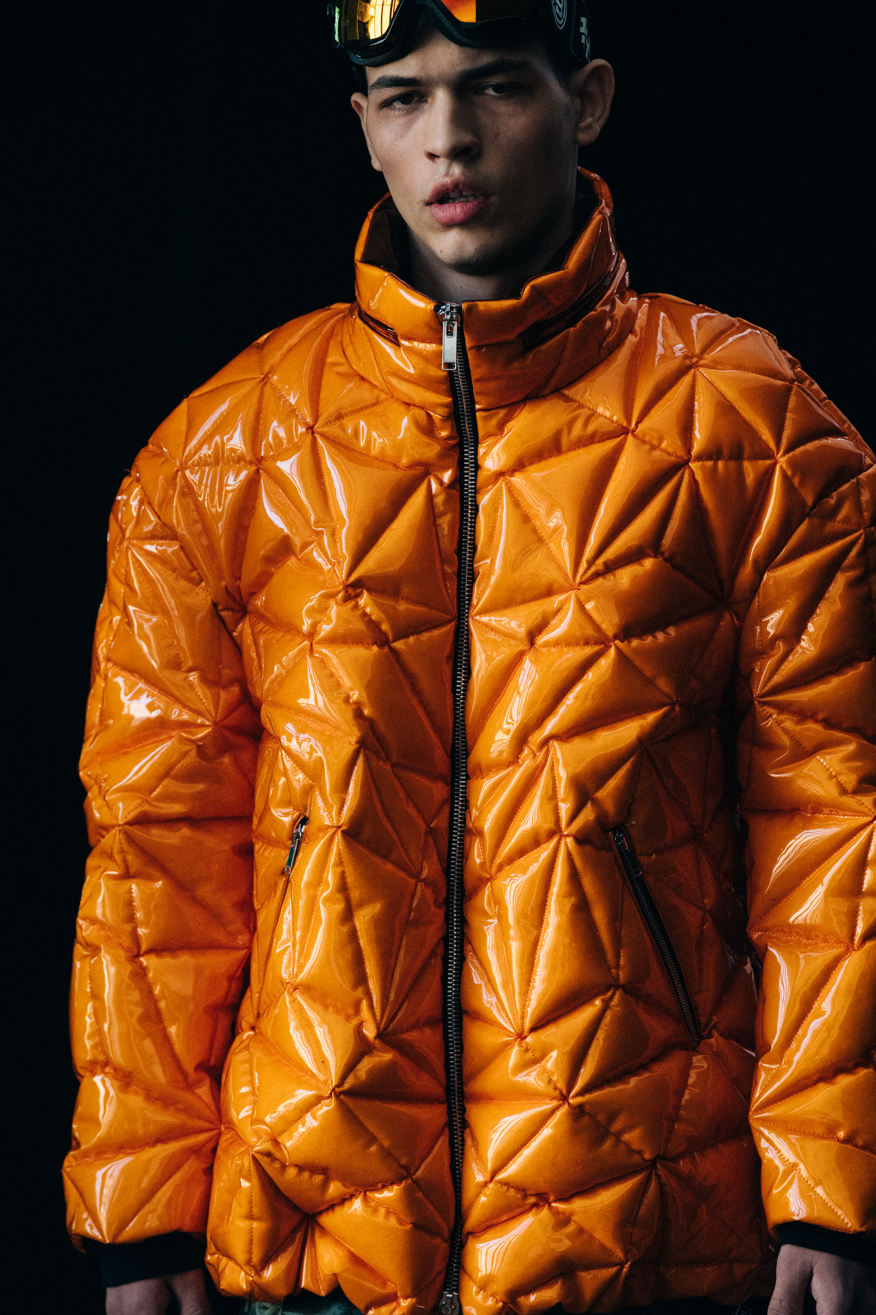 Model wearing orange outfit at Byblos