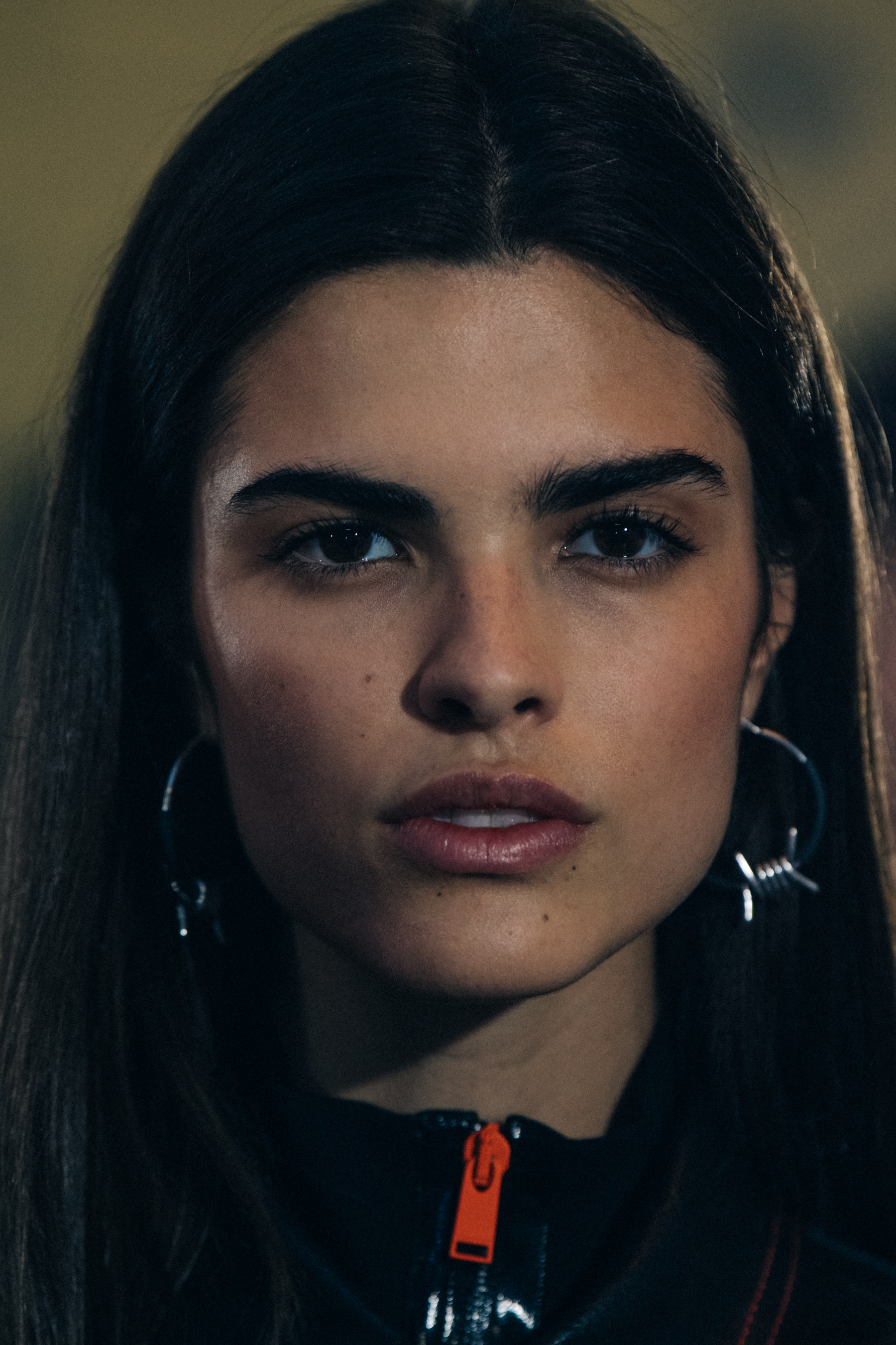 Portrait of model with long dark hair