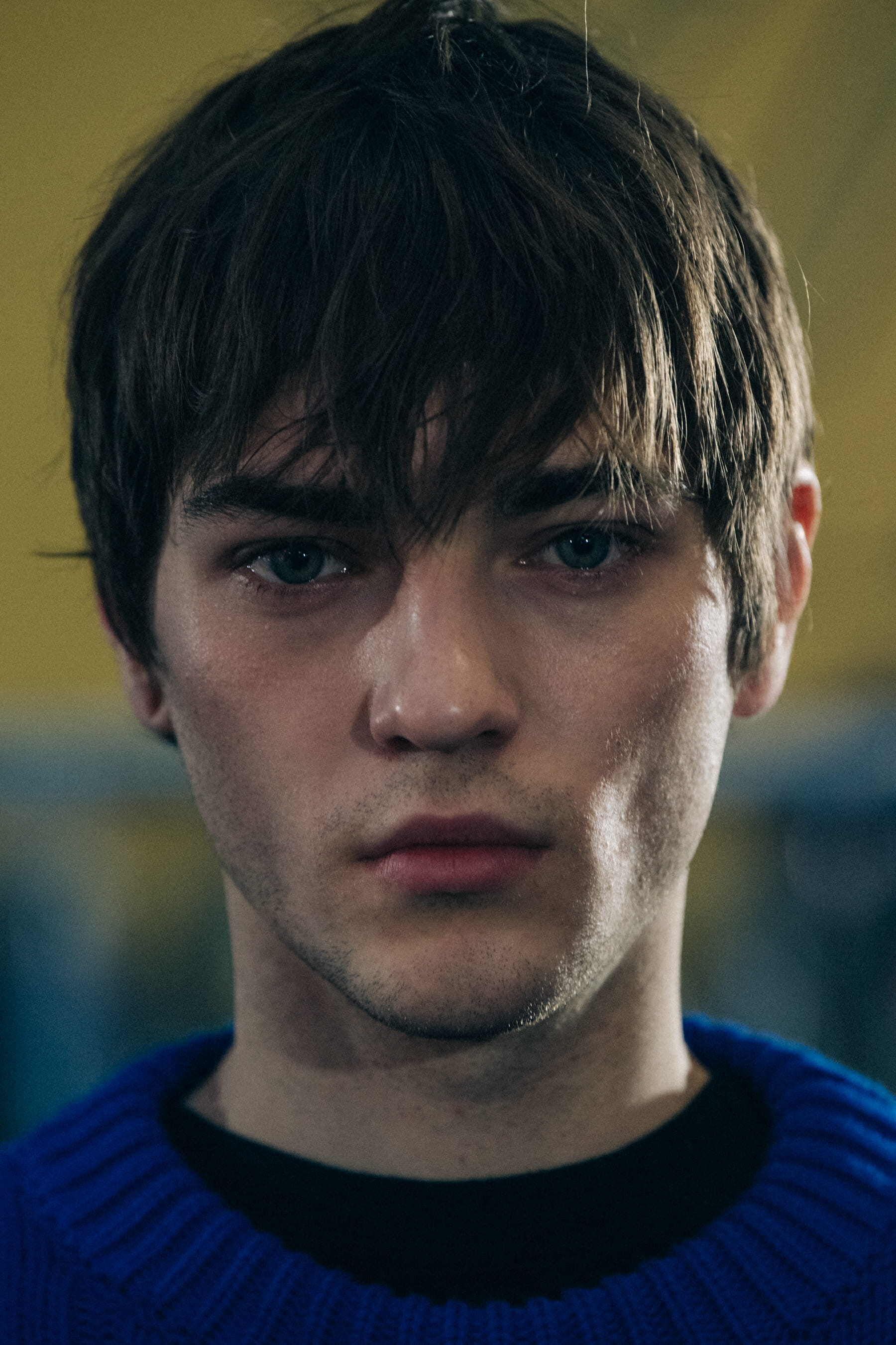 Portrait of model with messy dark hair