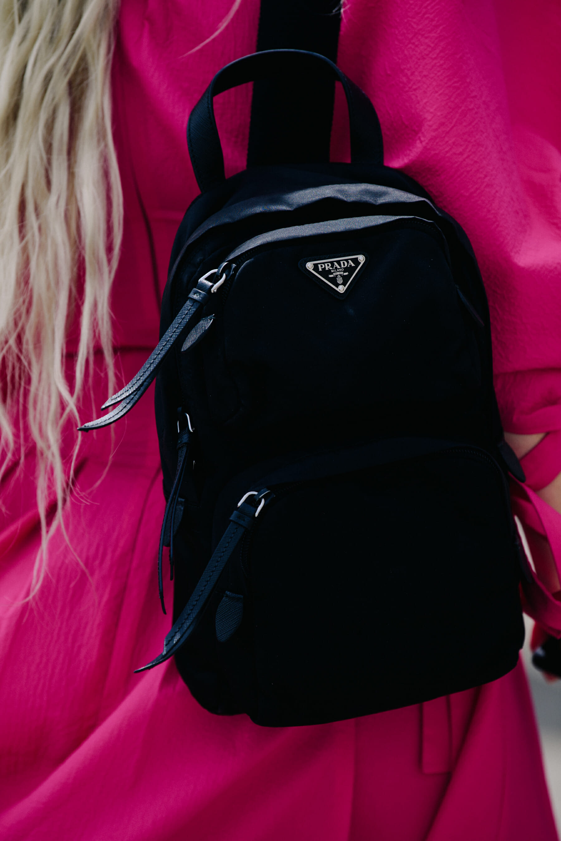 Woman carrying Prada bag