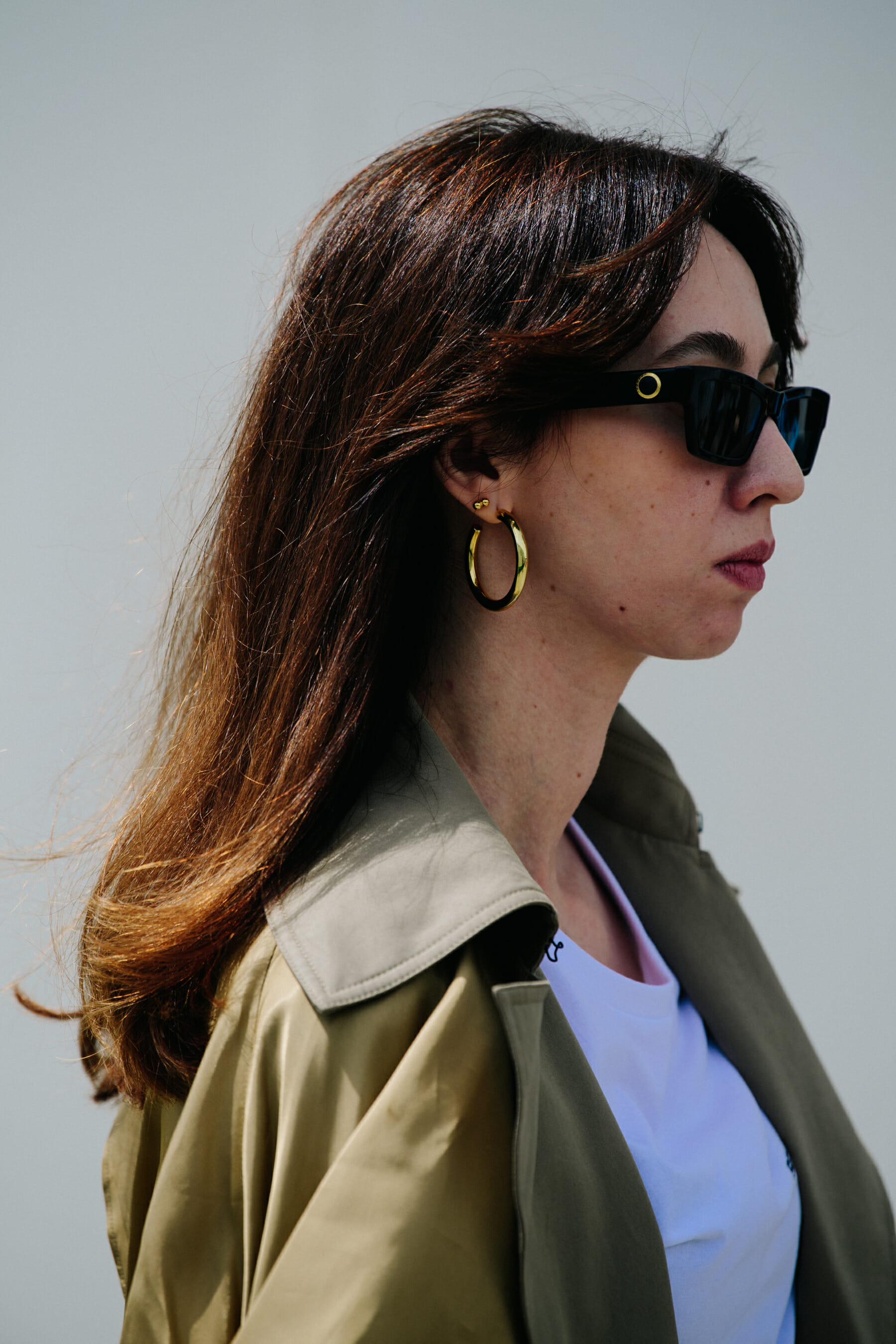Woman wearing trench coat