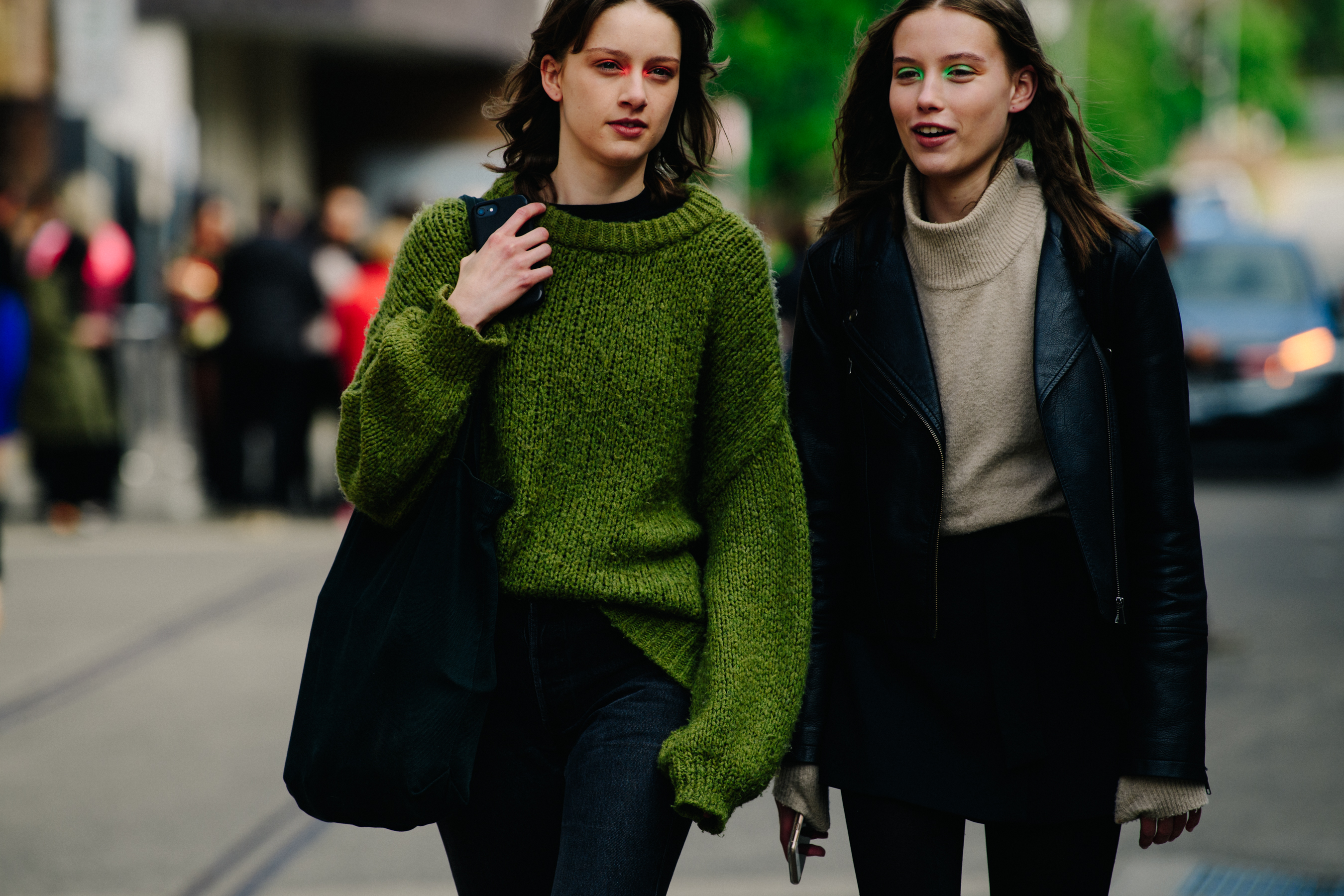 Two models wearing show makeup