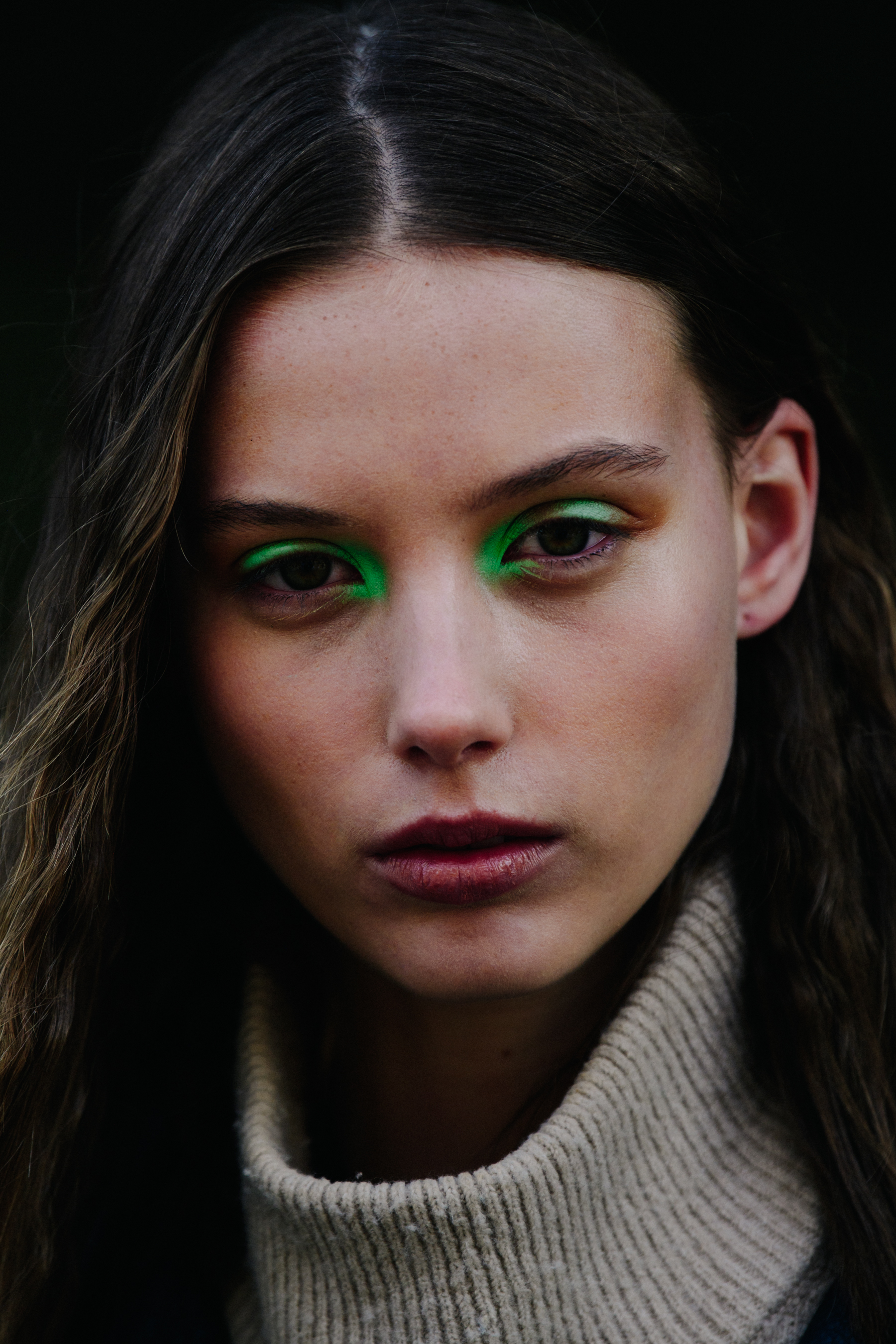 Portrait of model with green eye makeup