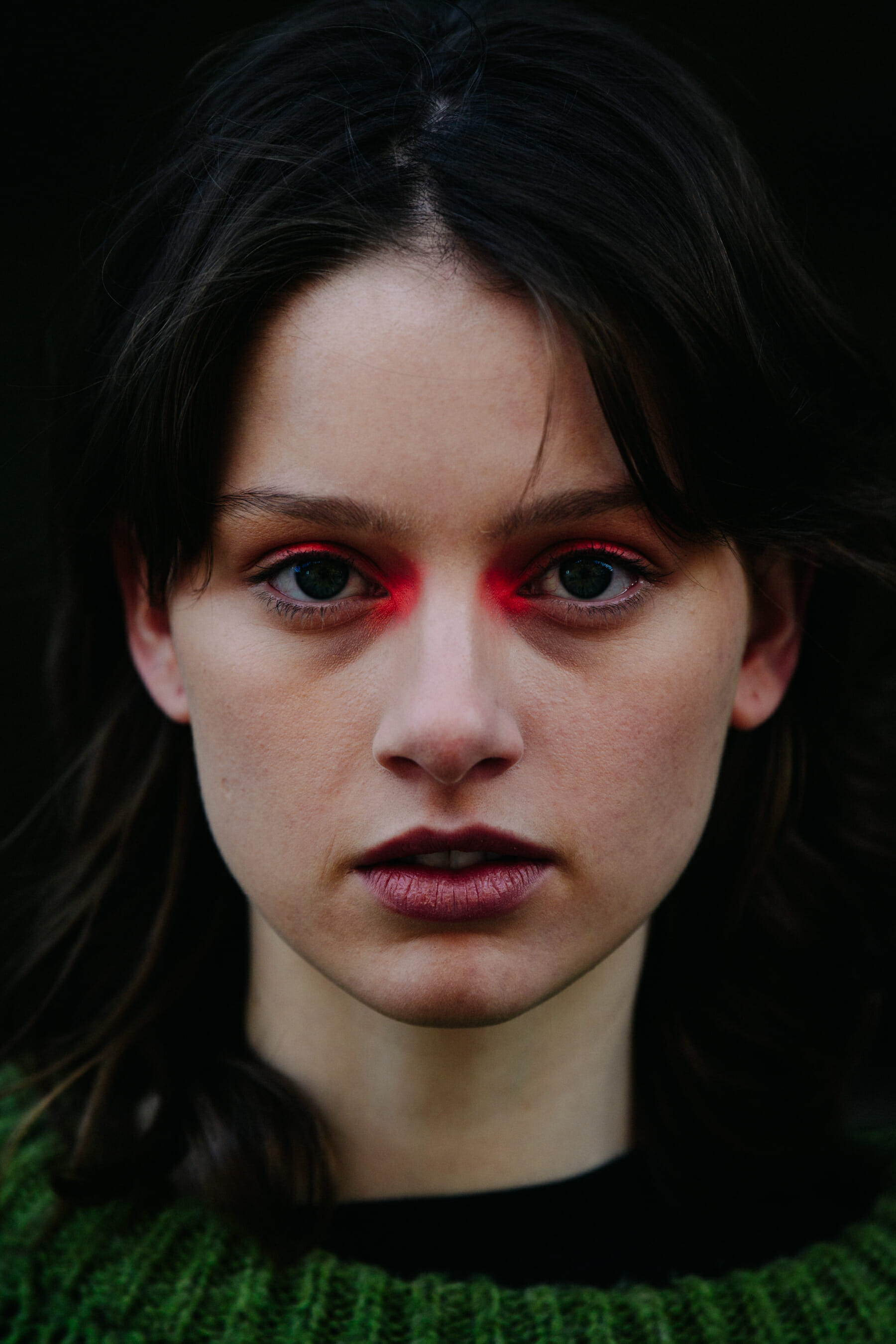 Portrait of model with red eye makeup