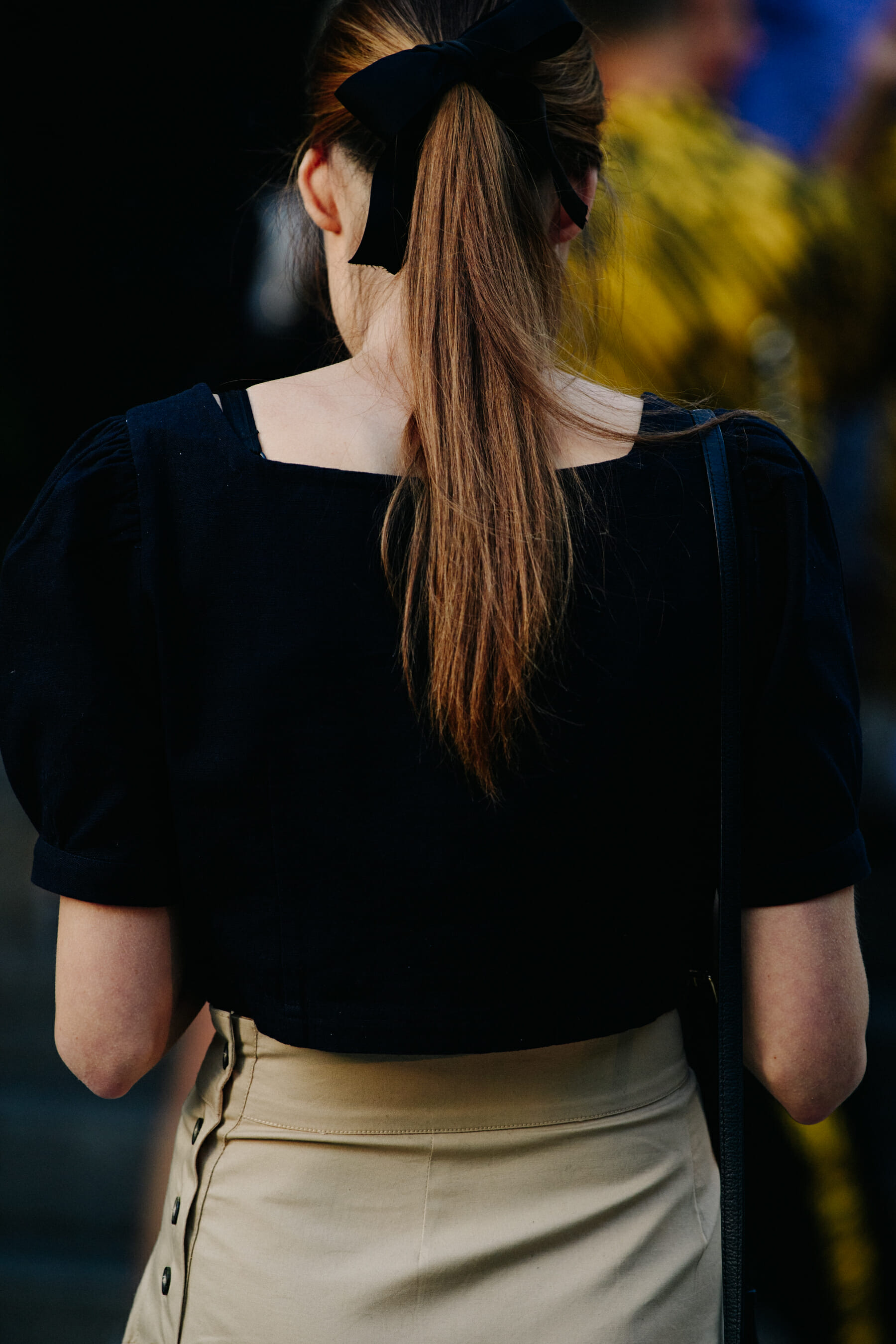 Woman wearing black top
