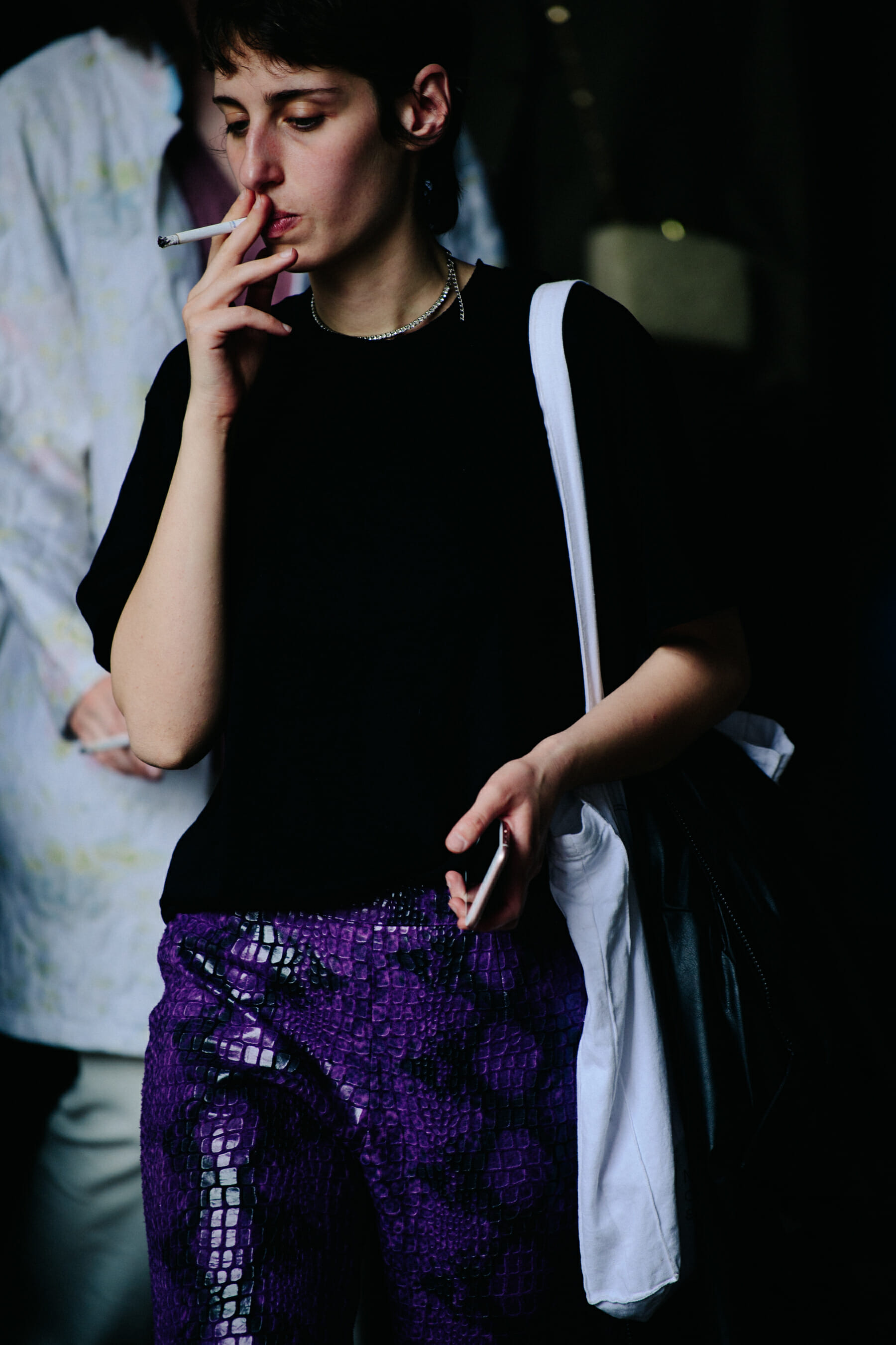 Woman wearing purple pants