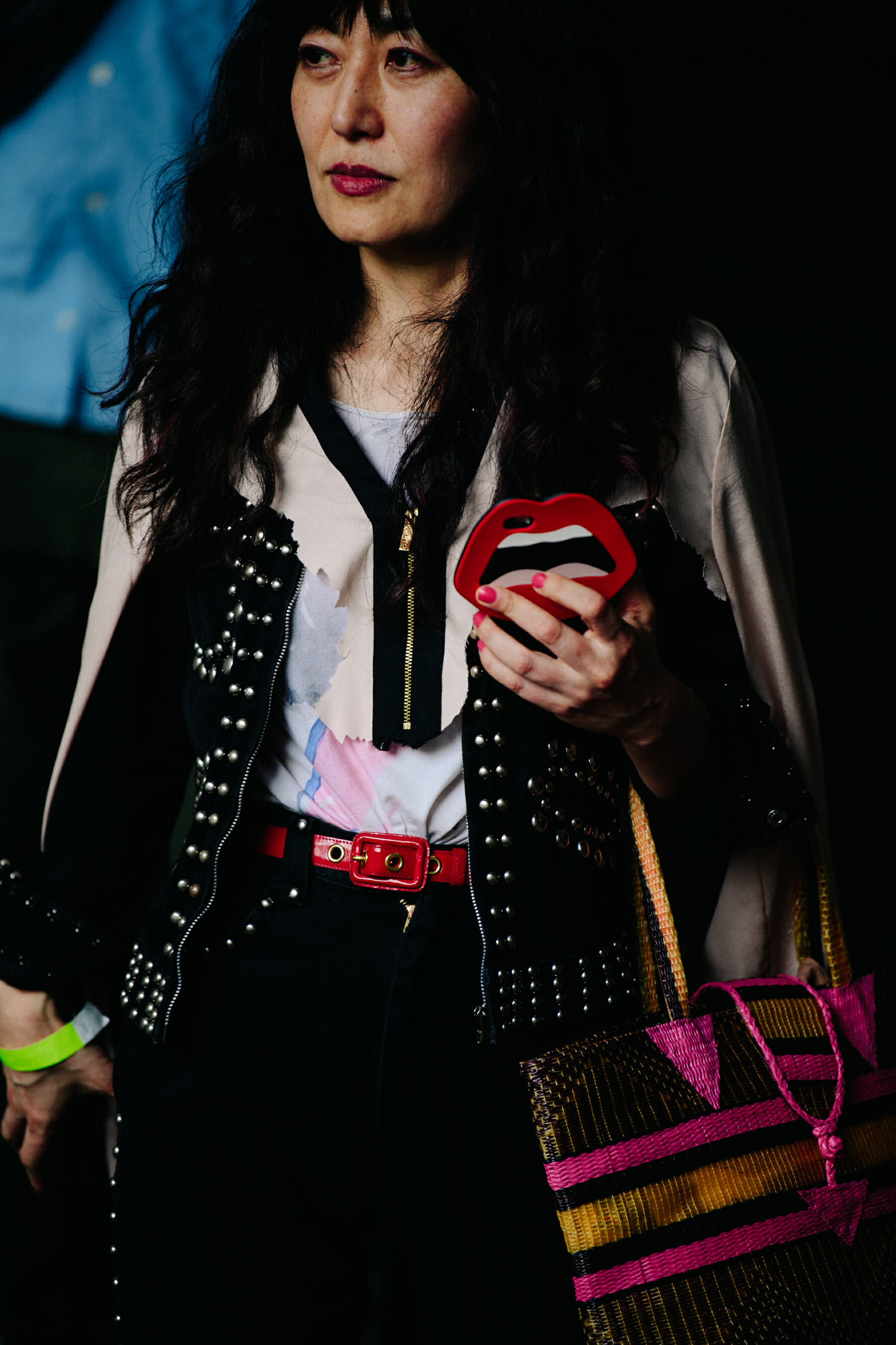 Woman wearing black studded jacket
