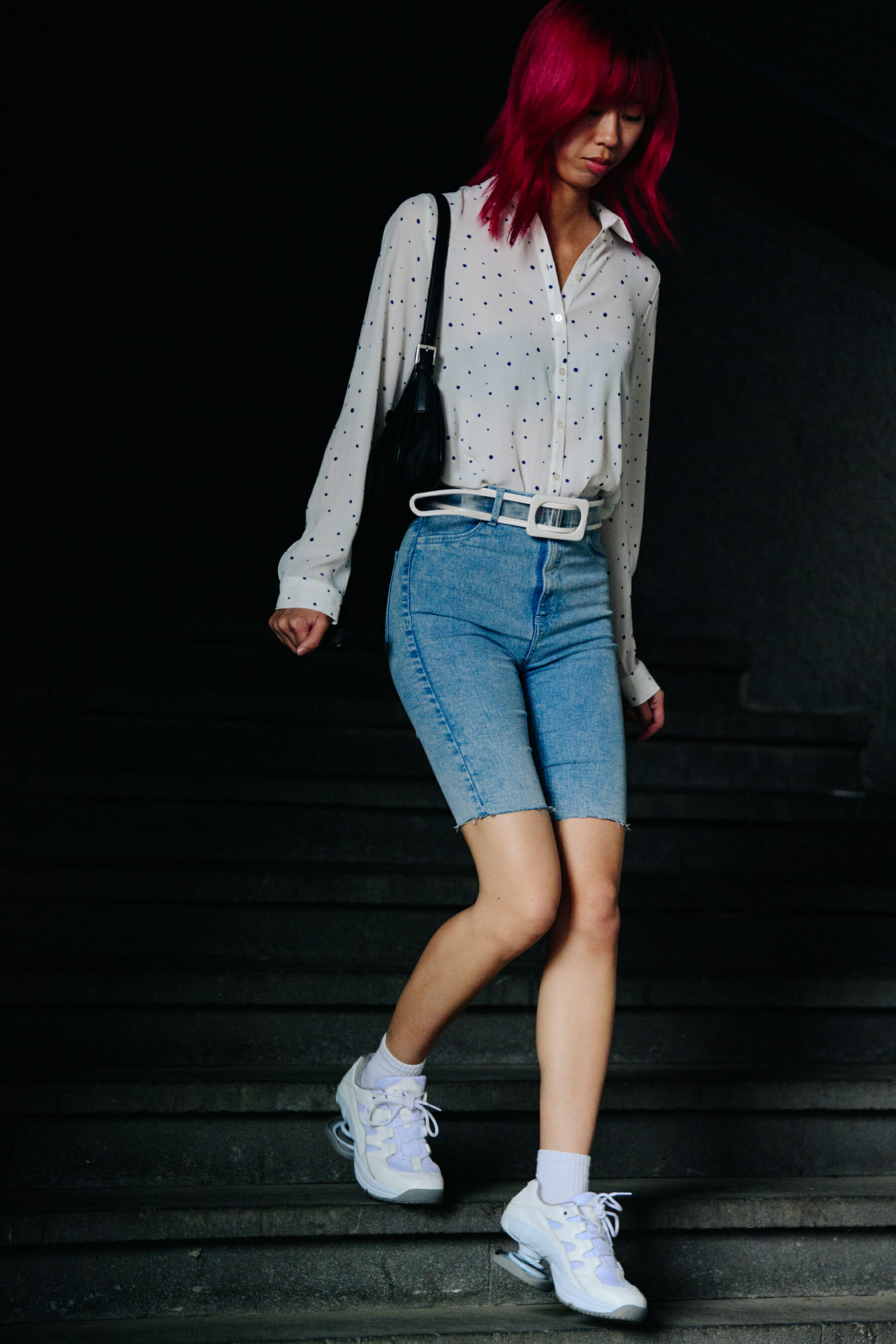 Woman wearing denim shorts