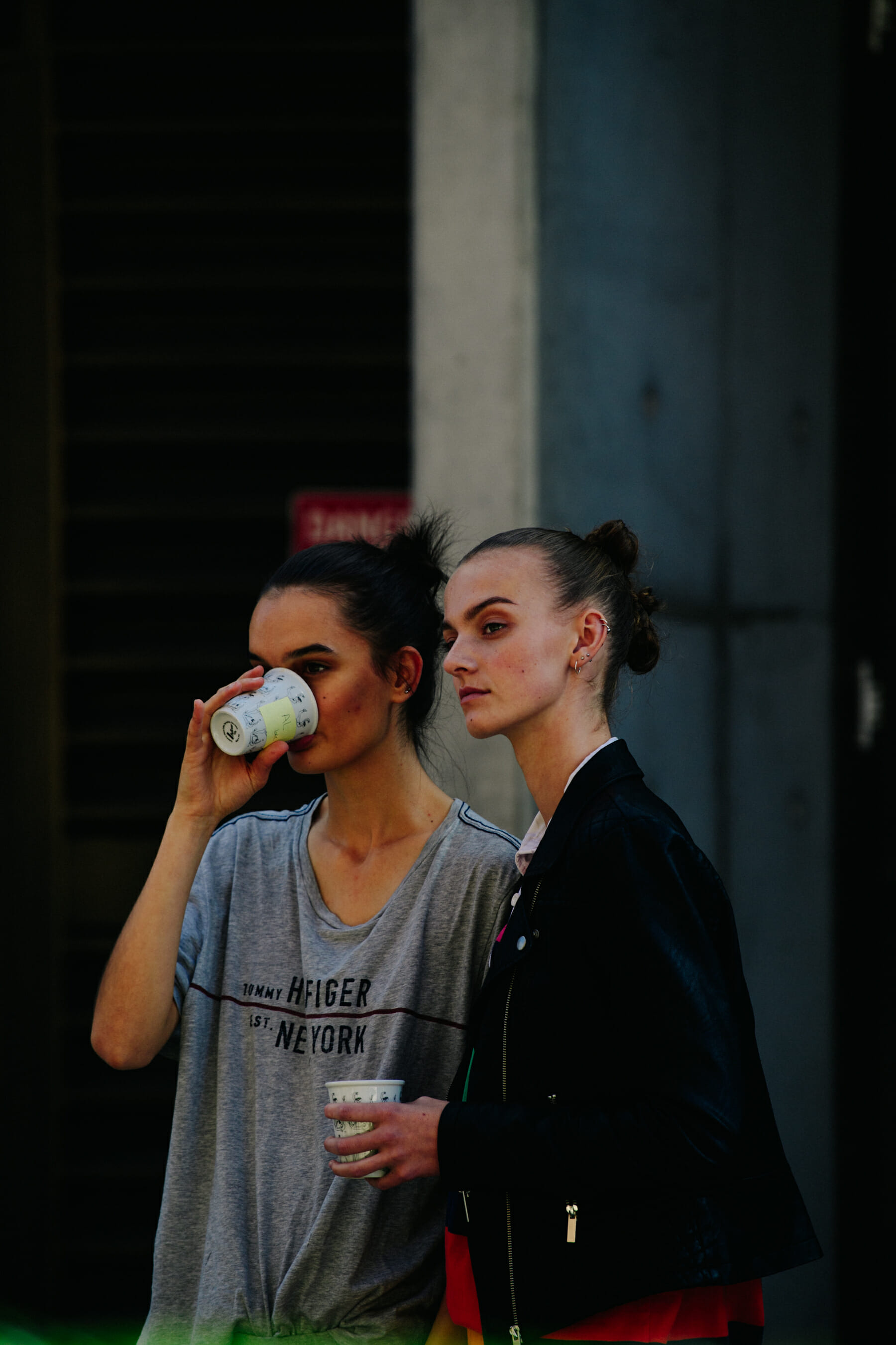 Two models drinking coffee