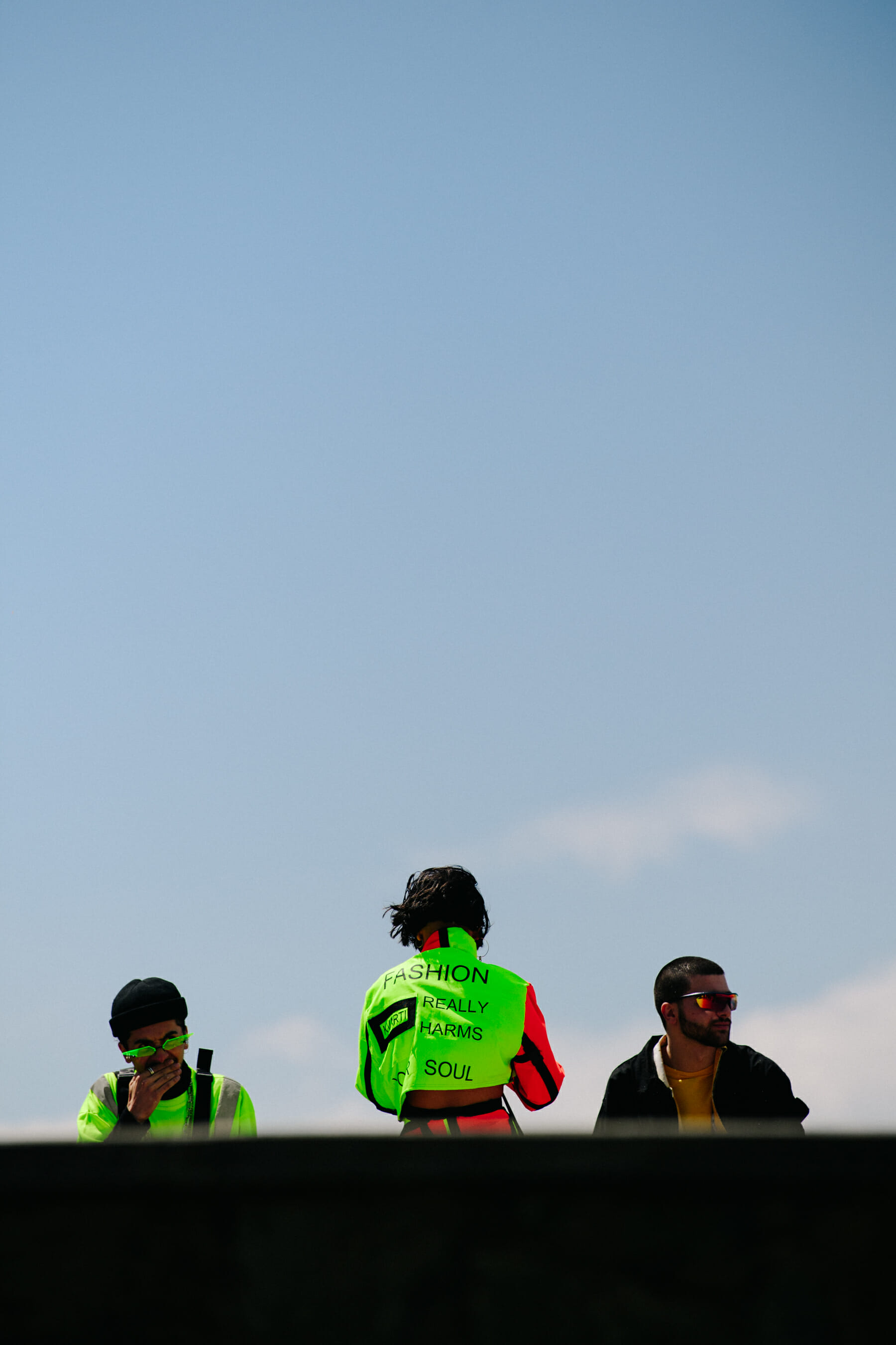 Three people wearing high vis clothing