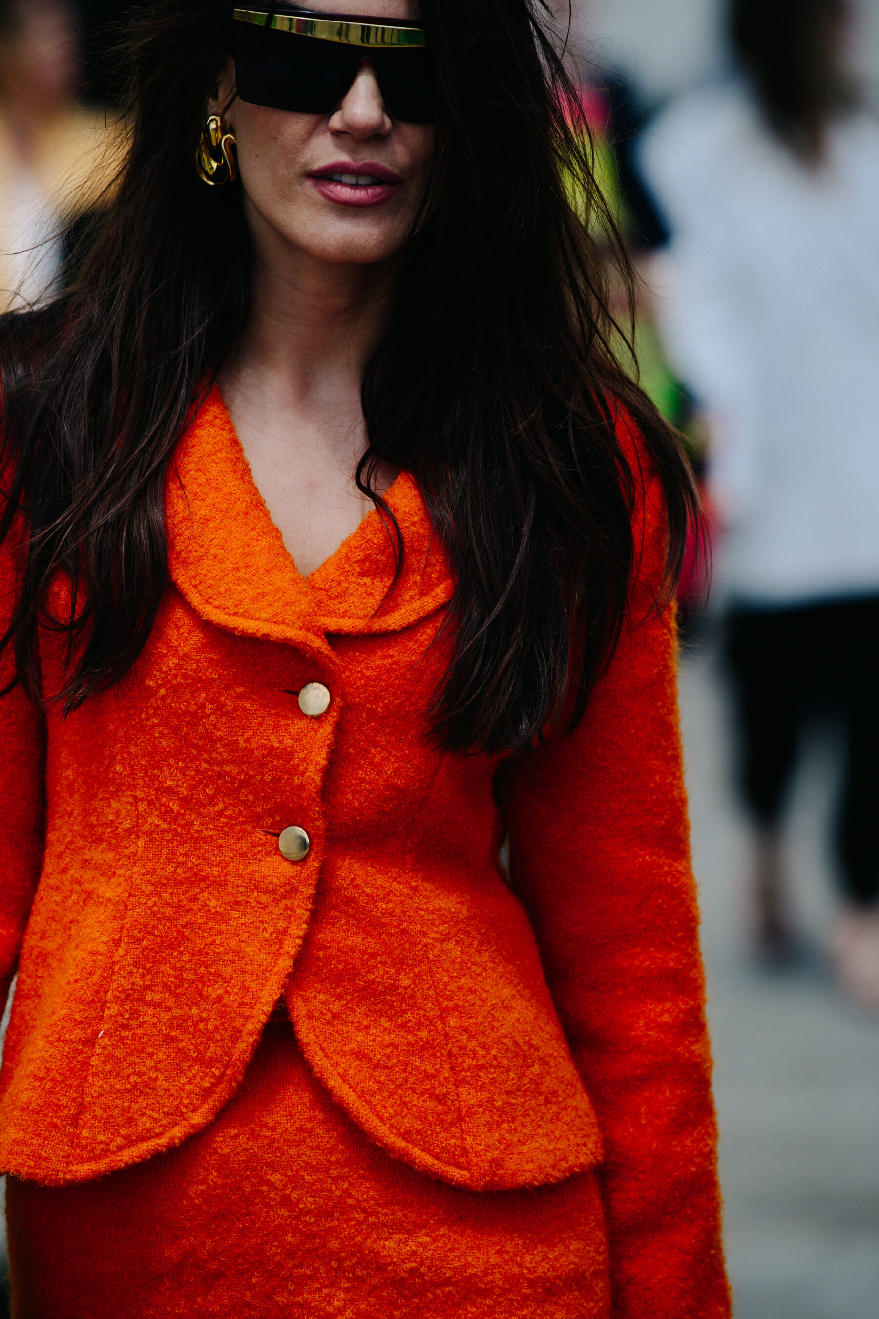 Turkish woman wearing orange suit