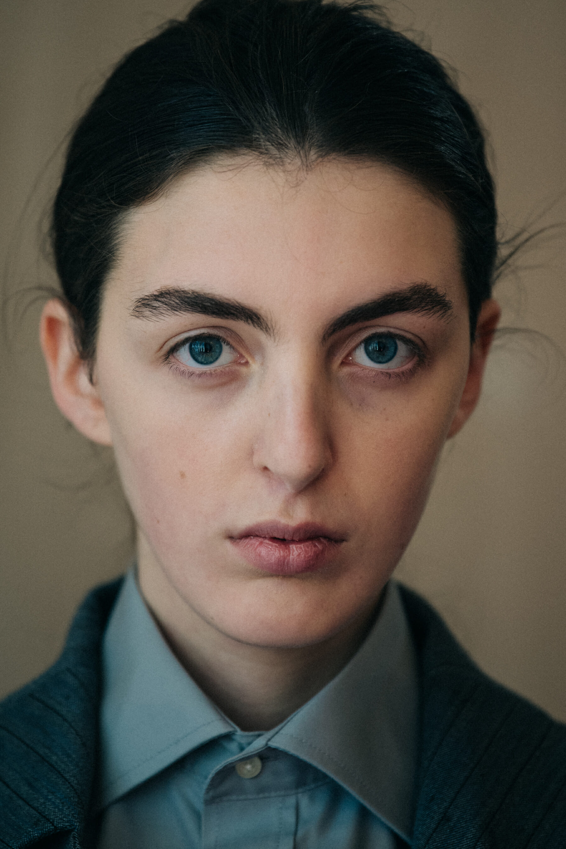 Portrait of model with tied back hair