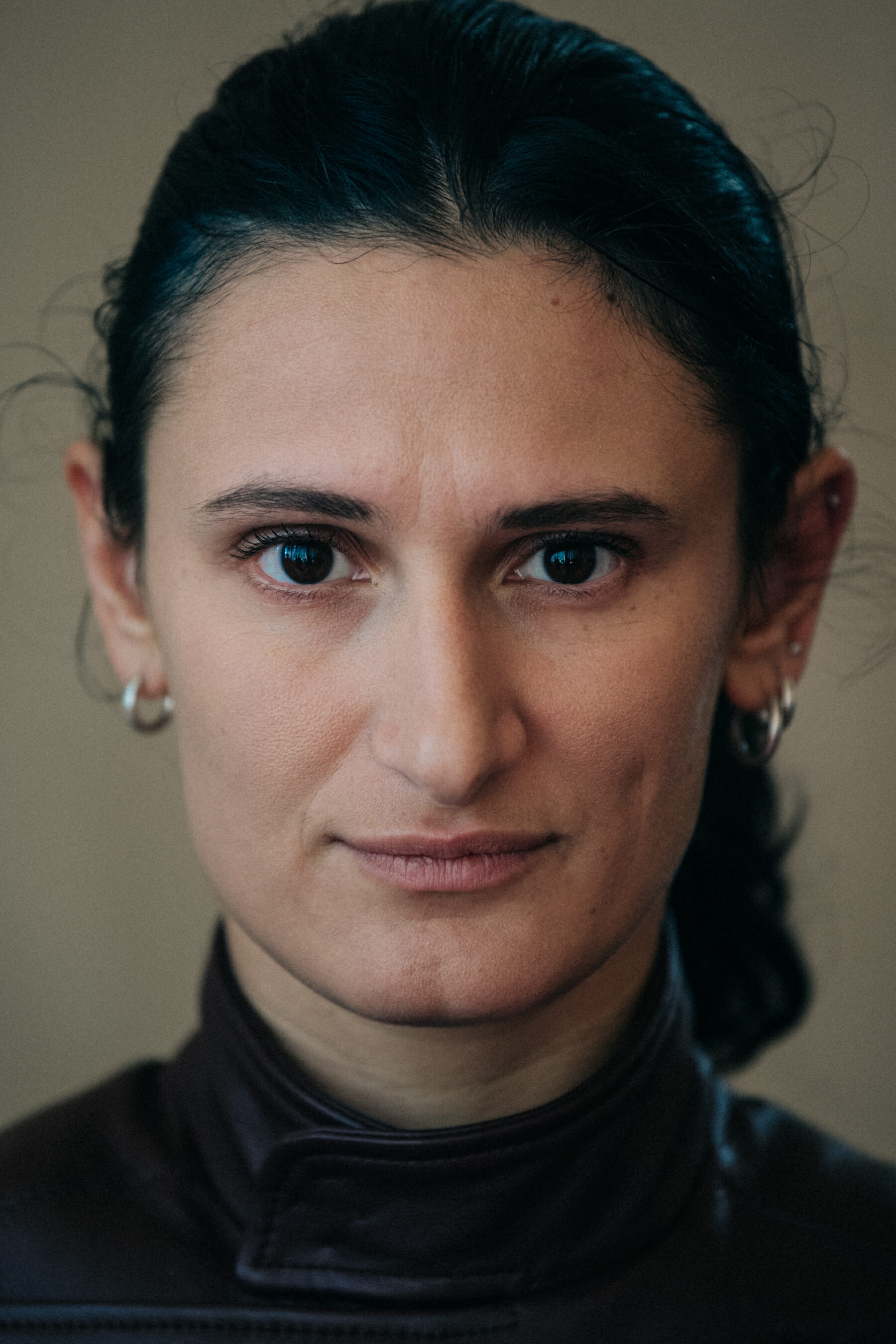 Portrait of model with tied back hair