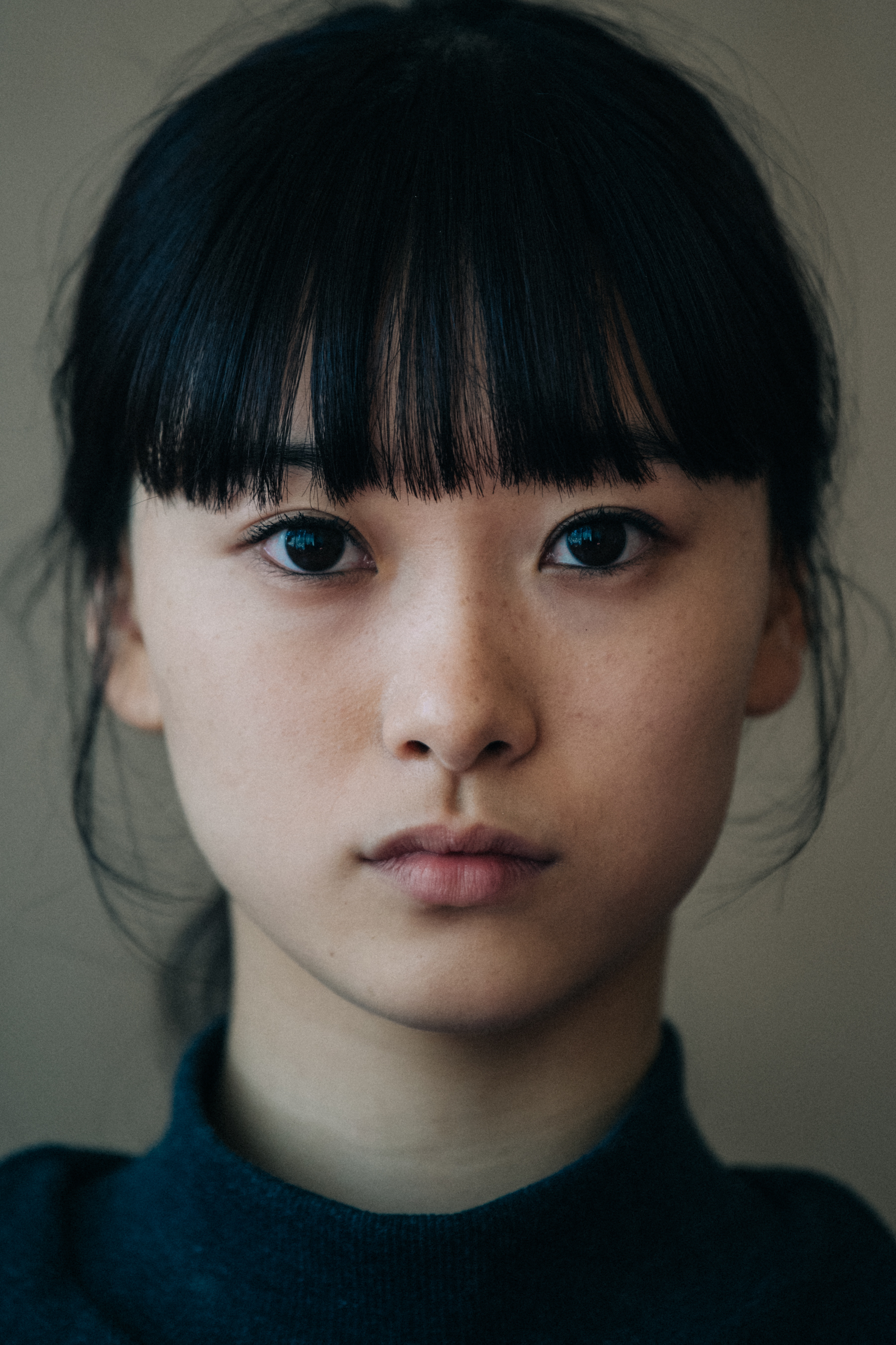 Portrait of model with tied back hair