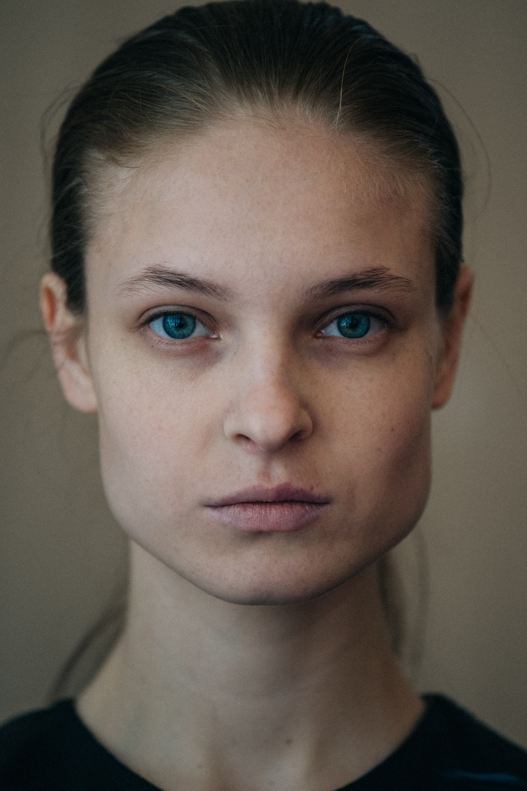 Portrait of model with tied back hair