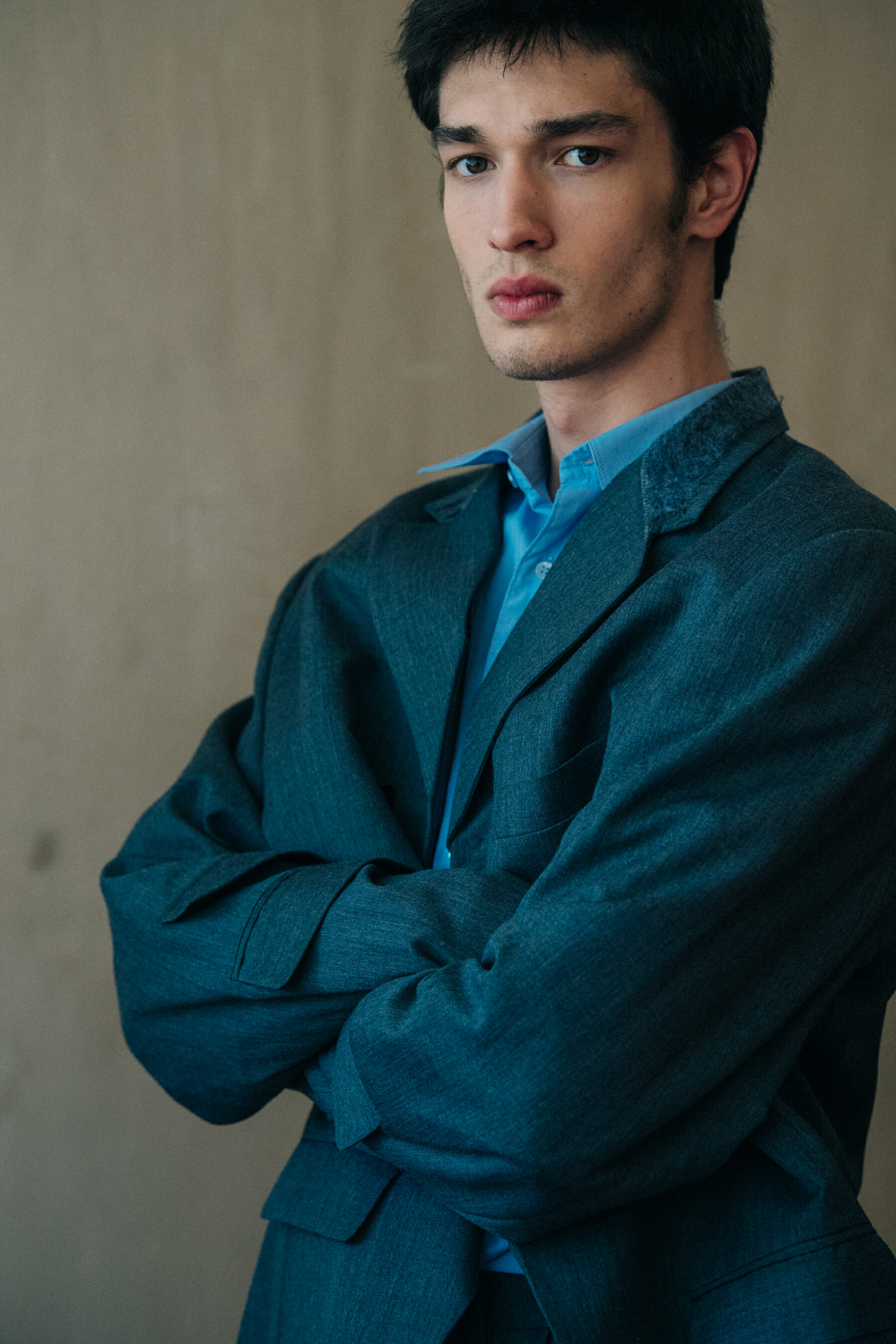 Model wearing blue outfit at Situationist